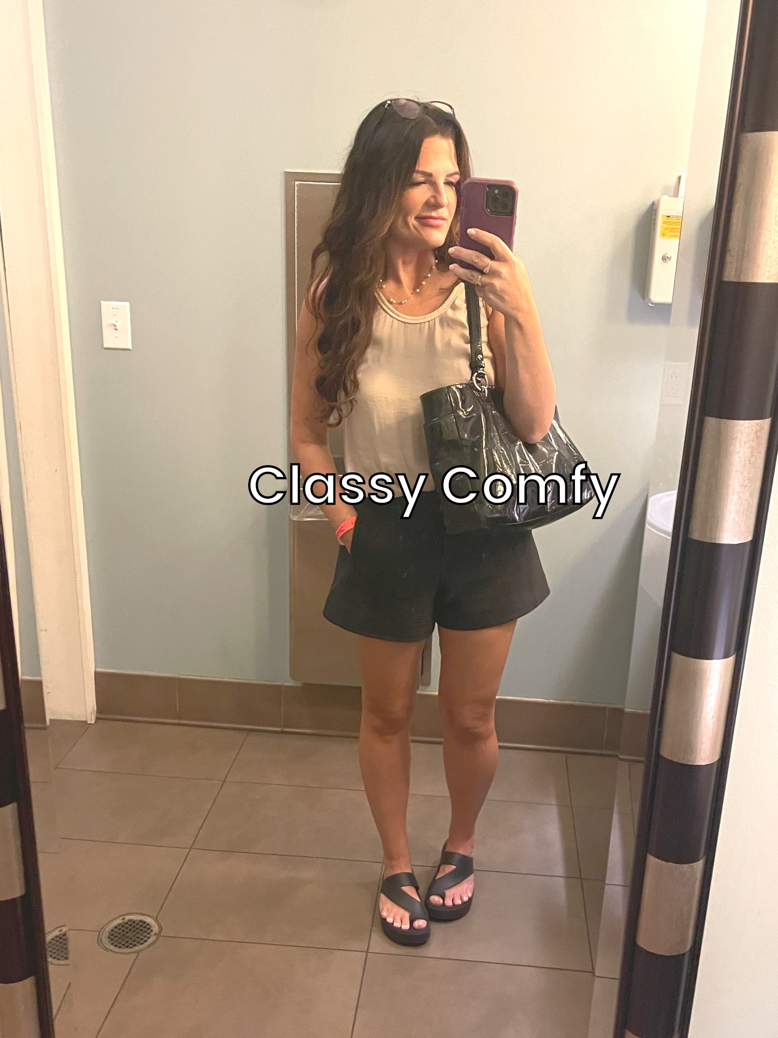 Mom outfit for long days when you need to be cool & comfortable but still look put together. Silk tank is thrifted so I linked similar. Stretchy elevated casual black shorts are Lululemon & these Crocs sandals are so cushy! This Coach tote has withstood years of abuse!

#LTKStyleTip #LTKOver40 #LTKTravel