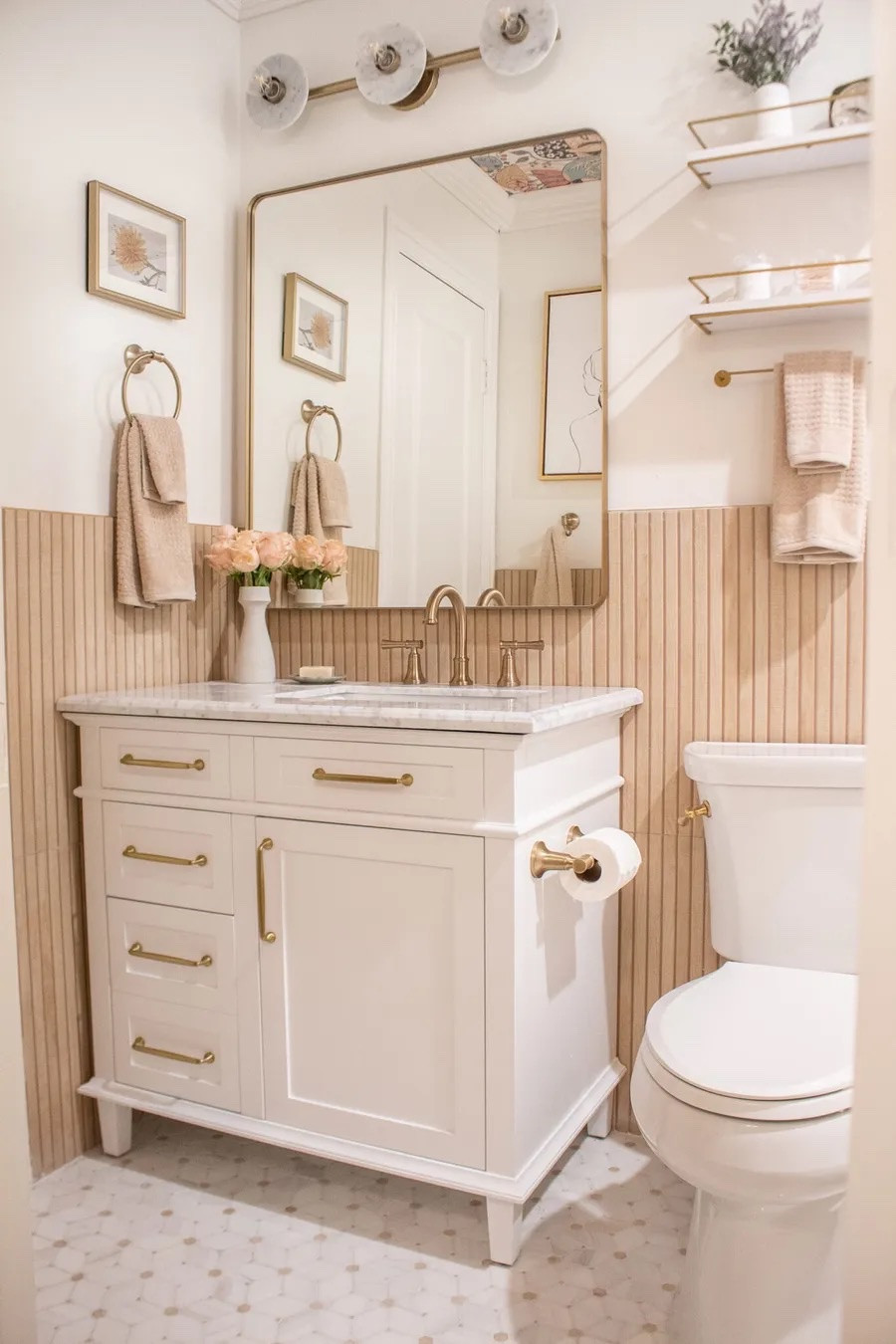 This bathroom is proof that the little details make the biggest difference 🤍 Loving the warm wood tones, brass accents and simple organization that make this space feel so cozy and elevated.

#LTKSeasonal #LTKHome