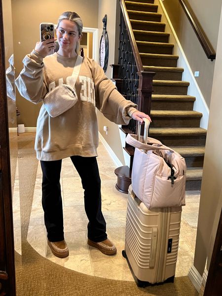 Travel look. All items here would make great gifts! Use code SARAHROSE10 for your customizable Sherpa belt bag that supports a small business. Wearing it with trendy chunky brown boots by MOU, The Bar.