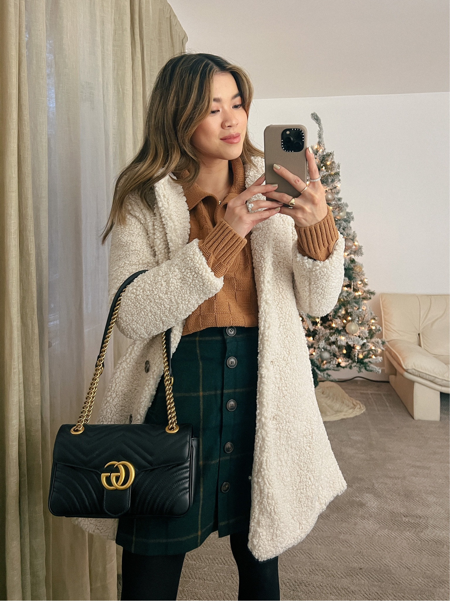 Abercrombie sweater layered under a cream J. Crew Sherpa coat with a Madewell wool skirt and black heels! 

Top: XXS/XS
Bottoms: 00/0
Shoes: 6

#winter
#winteroutfits
#winterfashion
#winterstyle
#holiday
#giftsforher
#abercrombie
#jcrew
#madewell
#gucci

#LTKHoliday #LTKSeasonal #LTKstyletip