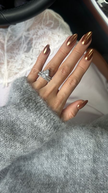 Fall nail
Copper chrome brown nails  
Engagement ring +  wedding band 


#LTKHolidaySale #LTKbeauty #LTKGiftGuide