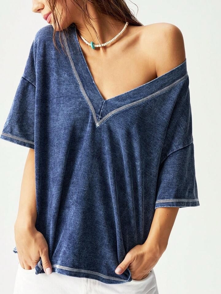 This slouchy v-neck tee is the perfect blend of comfy and cute. The soft washed fabric and oversized fit make it a go-to for casual summer outfits — easy to pair with denim, shorts, or over swimwear.

#LTKU #LTKSummerEdit #LTKSeasonal