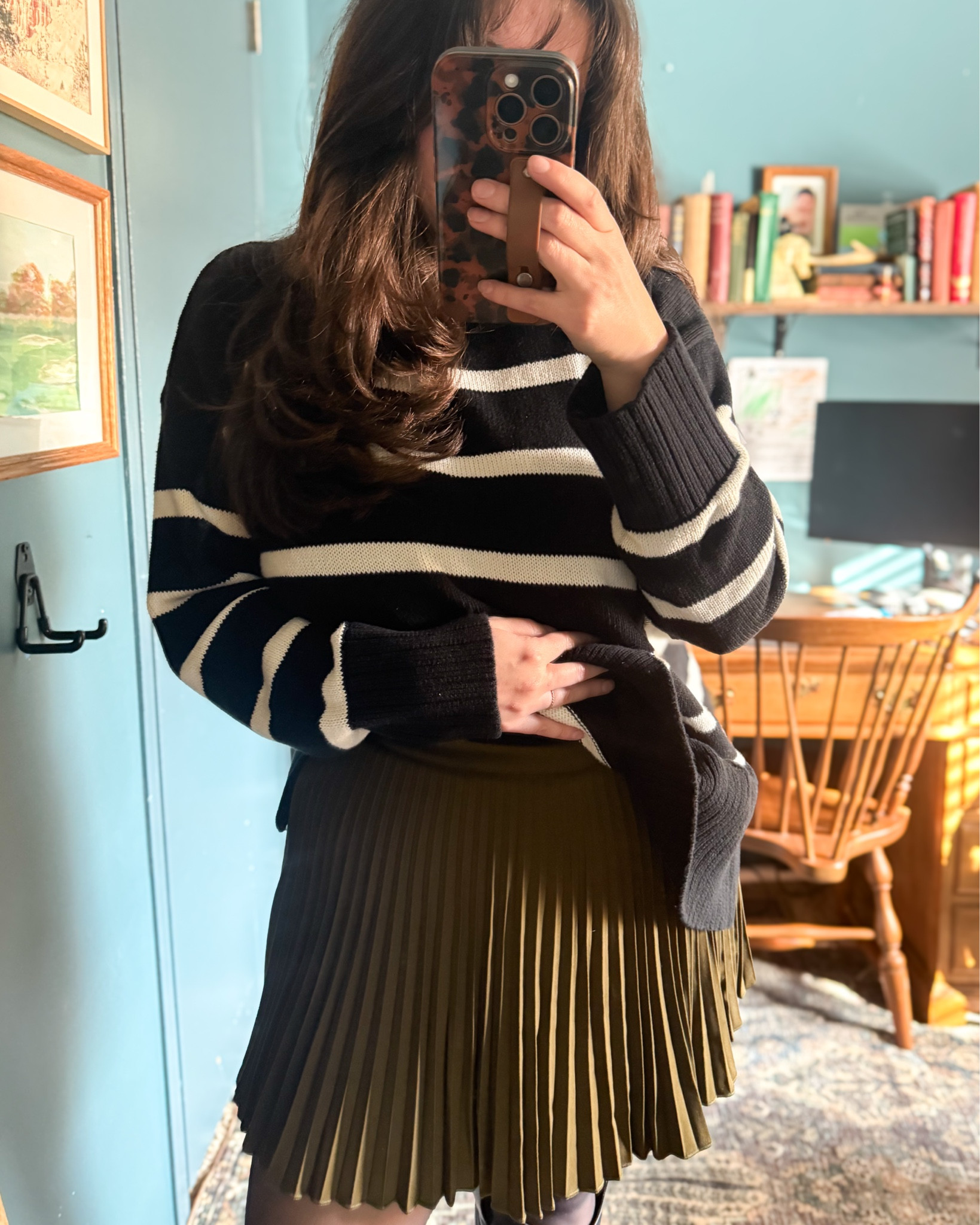 Guys I’m 10 months post c-section and still looking very “c-sectiony” if you know what I mean and this skirt (actually, skort) is SO flattering. The pleats go up to the waistband so it hides ✨all the things✨ 

And under $50!!!! Wearing an 8 (my new-normal size). Would be awesome for fall and the holidays 

#LTKFamily #LTKFindsUnder50 #LTKSeasonal