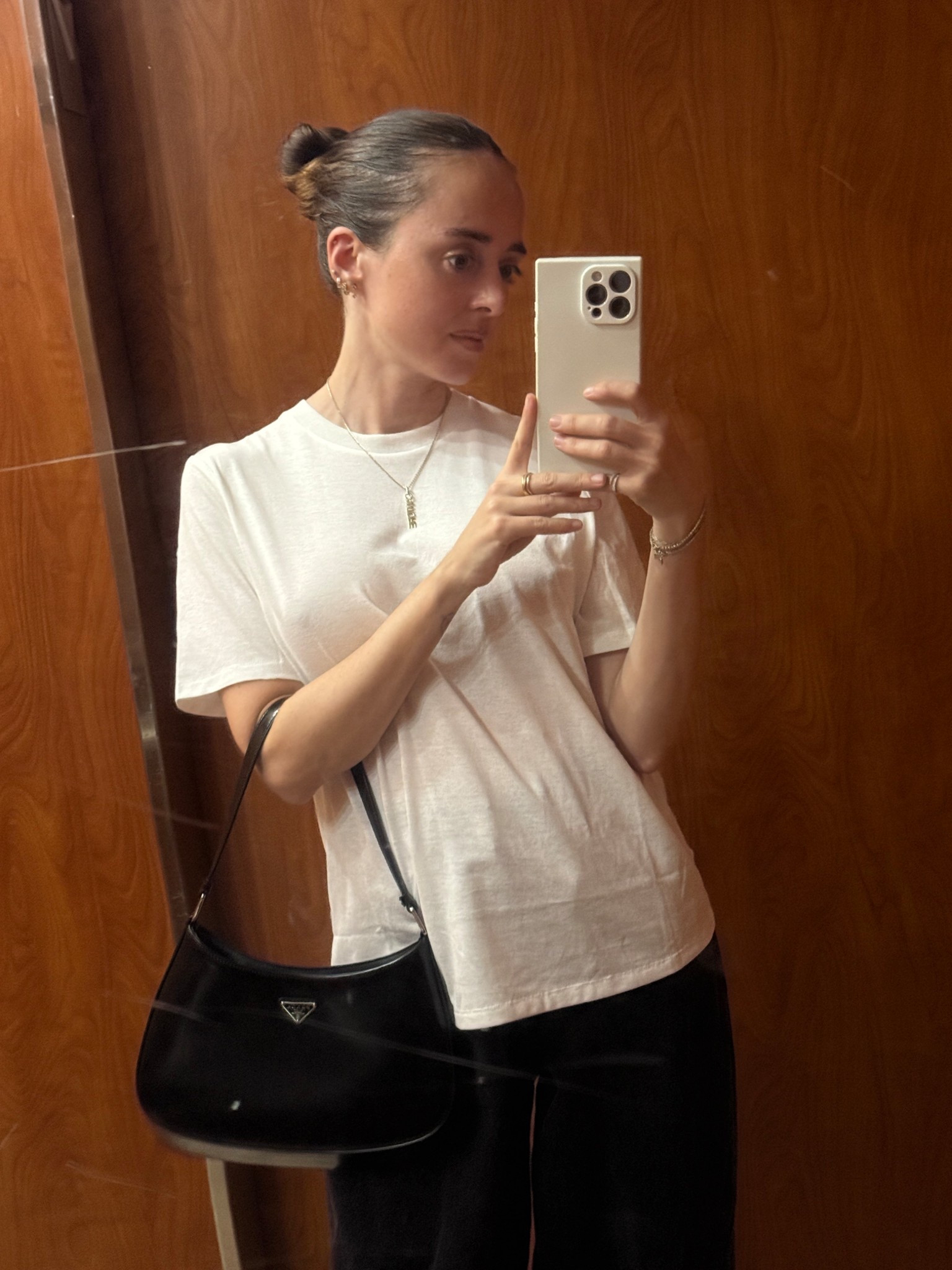 A simple, casual black and white outfit for a night out. 

#blackdenim 
#prada
#casual 
#nightout 

#LTKootd #LTKPetite #LTKTravel