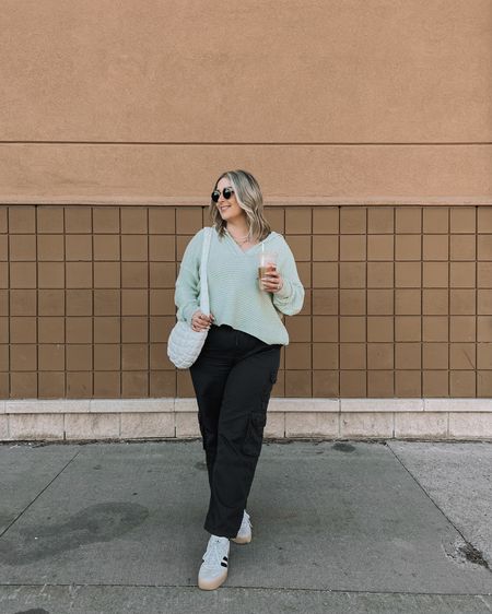 Casual midsize spring outfit - black cargo pants (L), free people sweater (M, also linked similar), quilted puffer bag, adidas sambas 



#LTKSeasonal #LTKmidsize #LTKstyletip