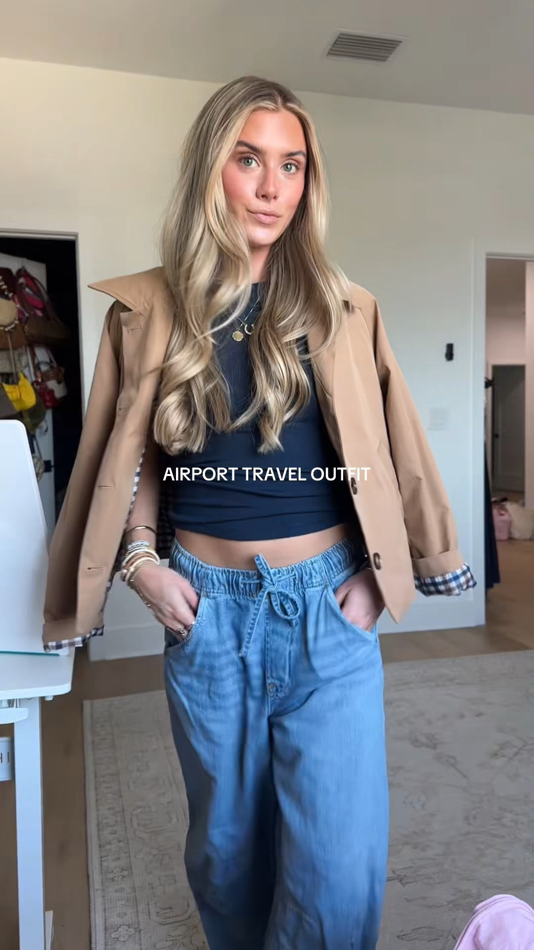 My travel outfit to go to KY!! My jeans are size xs from gap the most comfortable travel pants. My tee is size xs from @nuuds   the most slinky soft fabric with my amazon trench coat size small layered overtop. And my sneakers are Shu Shop.

#LTKootd #LTKTravel #LTKdayinmylife