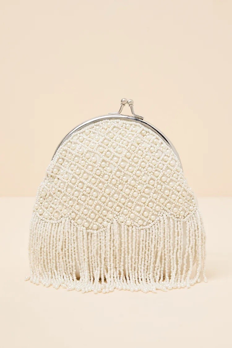 White beaded pearl fringe clutch — elegant, lightweight, and perfect for weddings, parties, and evening styling. Under $50.

Keywords:

* pearl fringe clutch
* beaded clutch bag
* white evening clutch
* statement clutch
* bridal clutch
* fringe handbag
* embellished clutch
* formal clutch
* wedding guest accessory
* bridal after party
* evening outfit styling
* formal event accessories
* party bag
* date night accessory
* luxury styling
* special occasion bag
* vintage glam aesthetic
* old hollywood style
* soft glam fashion
* bridal chic
* elegant evening style
* textured fashion
* statement accessory
* timeless glamour

#LTKWedding #LTKMothersDay #LTKTravel