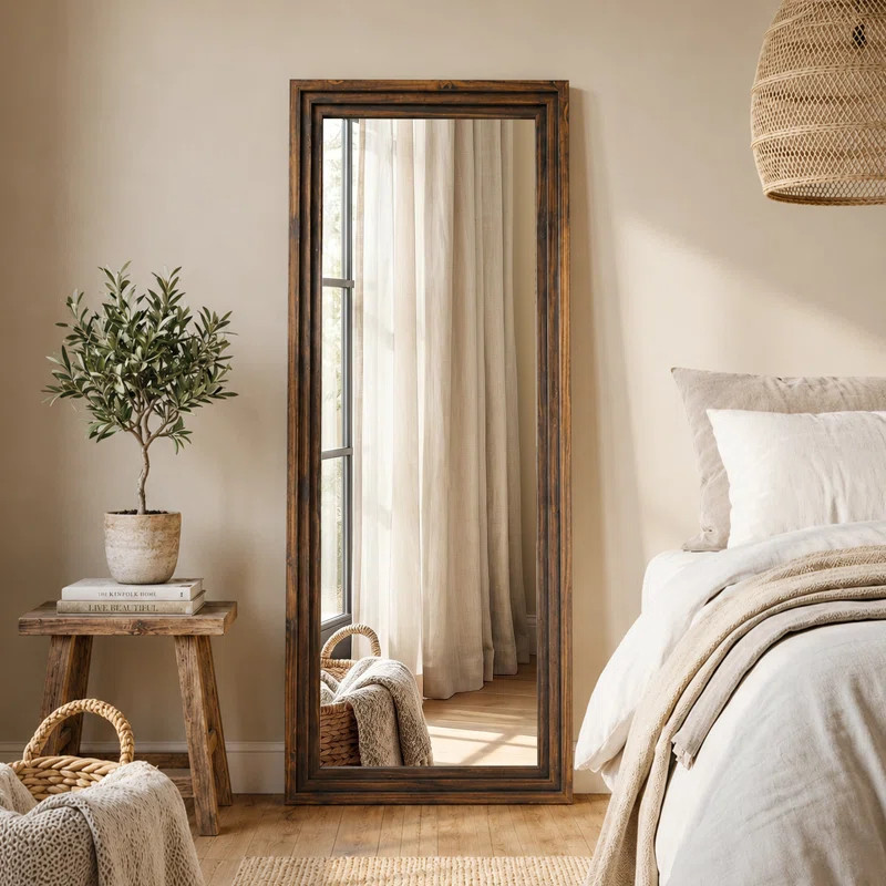 Bring warm vintage character to your home with this full-length floor mirror. Designed with a lay... | Wayfair North America