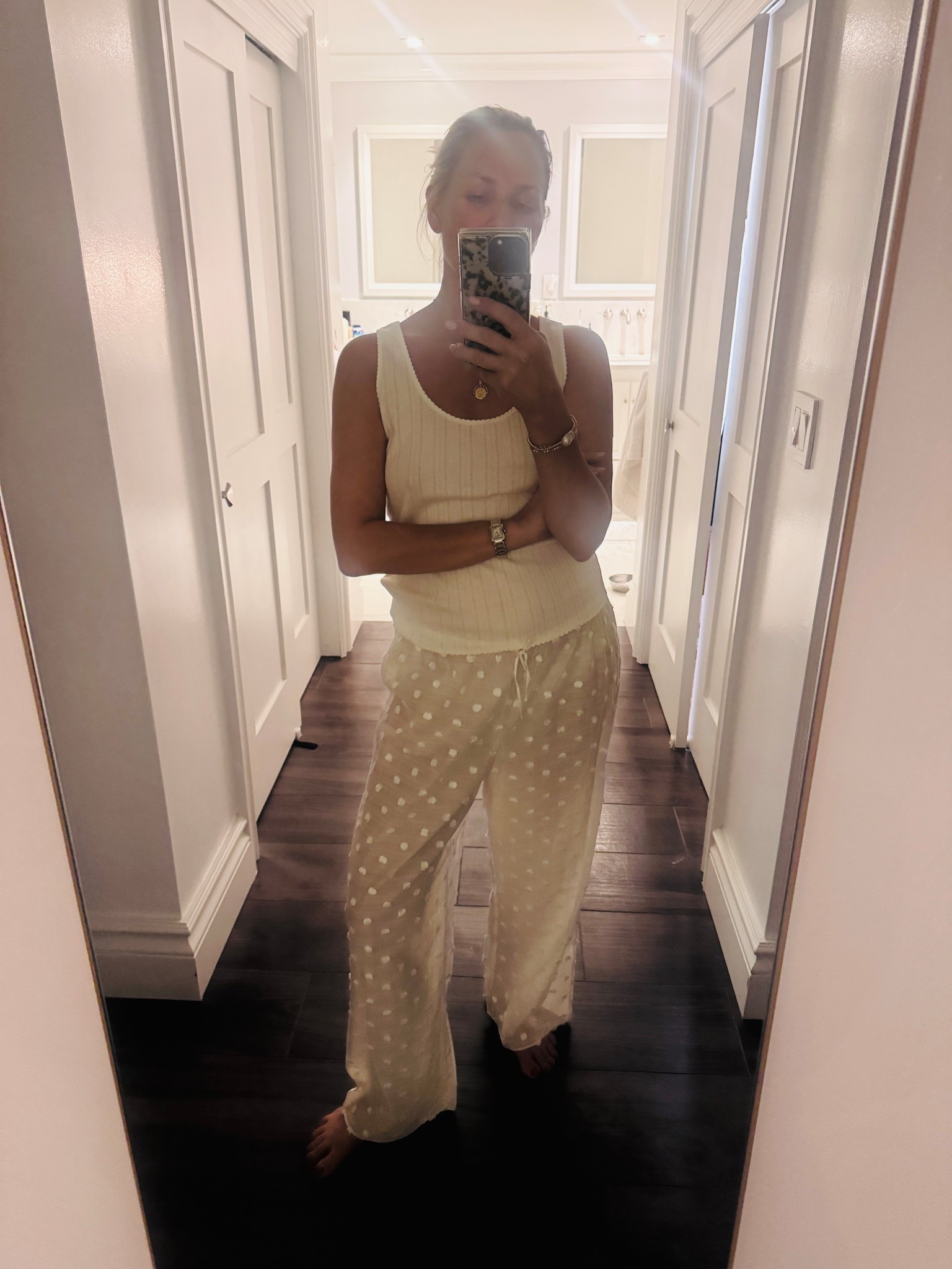 The perfect lightweight slightly sheer beach pants with cute little Pom poms on them. These might be my favorite summer purchase so far! It has a matching tank top but I Also love these pointelle tank tops,
Currently on sale 

#LTKOver40 #LTKSummerEdit #LTKSaleAlert