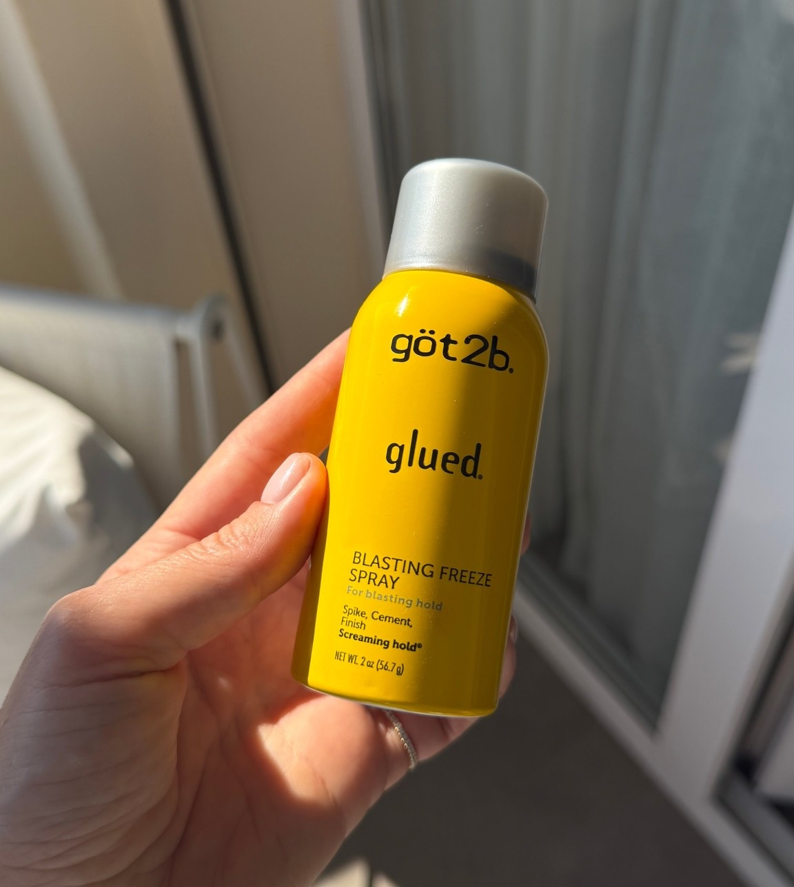 This spray won’t let a strand move around on your head. Love it for a tight pony or bun.