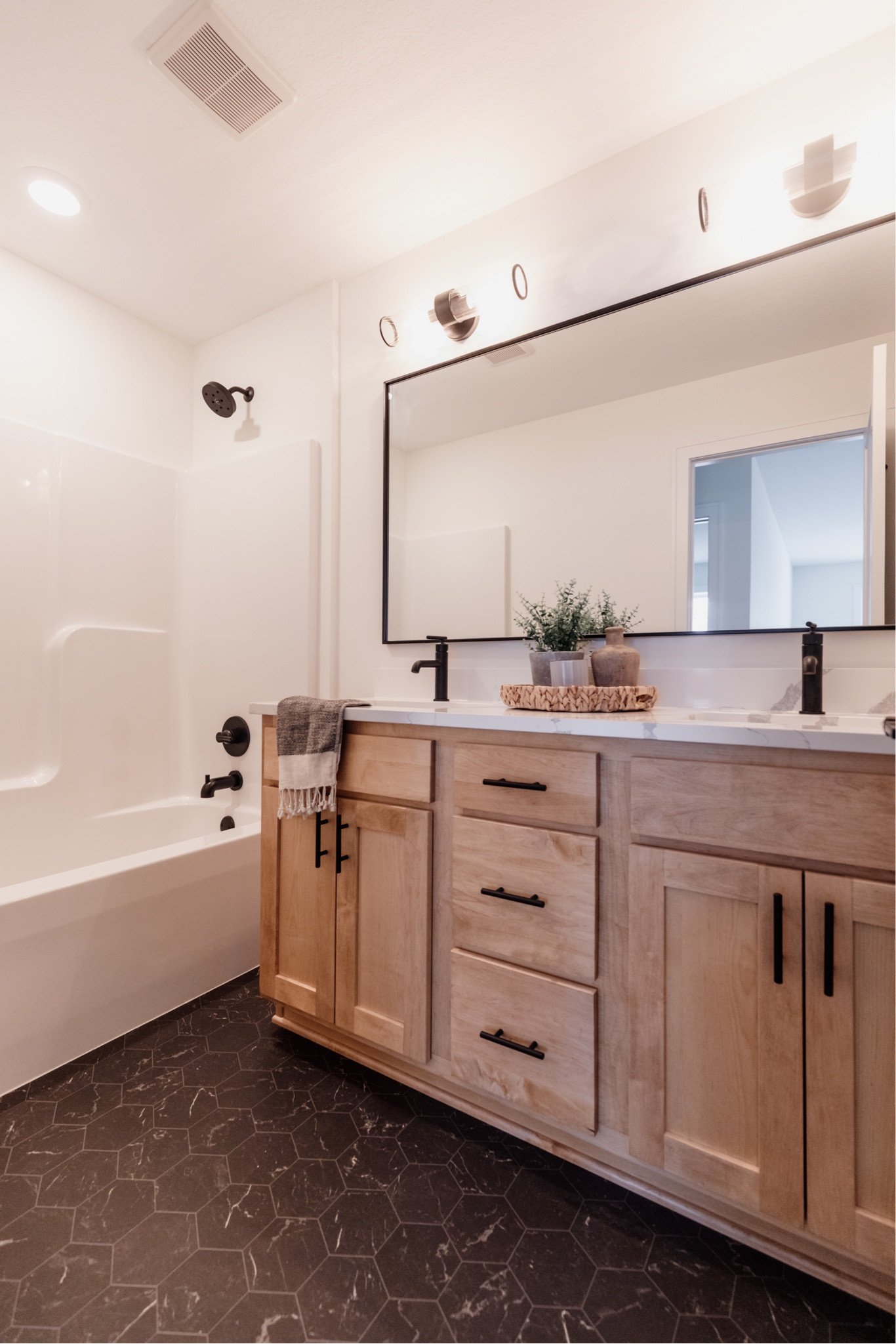 Clean and simple bathroom. Light stained cabinets paired with black accents.


Bath design
Bath selections
Neutral bath 
Kids bath
Home design 
Home accents

#LTKfamily #LTKhome #LTKSeasonal