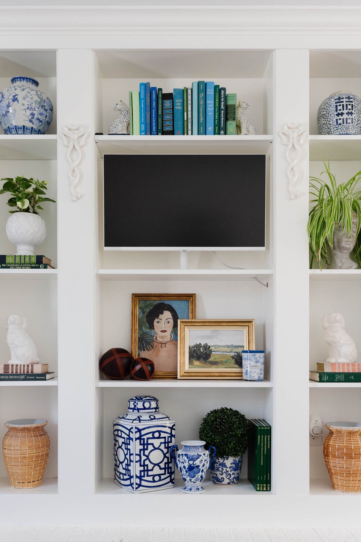 | Use code PEGGYH15 for 15% off all full price Scout & Nimble items | We brought Grandmillennial charm to this built-in with layers of blue + white, collected details, plants, and a touch of vintage warmth.

A styled bookshelf is like a mini reflection of your home—balanced, beautiful, and full of life and personality. Swipe to see how we transformed this space with thoughtful styling, mixing chinoiserie, artwork, greenery, and classic textures. 

See the entire Project Grandmillennial reveal on the blog!

#LTKHome