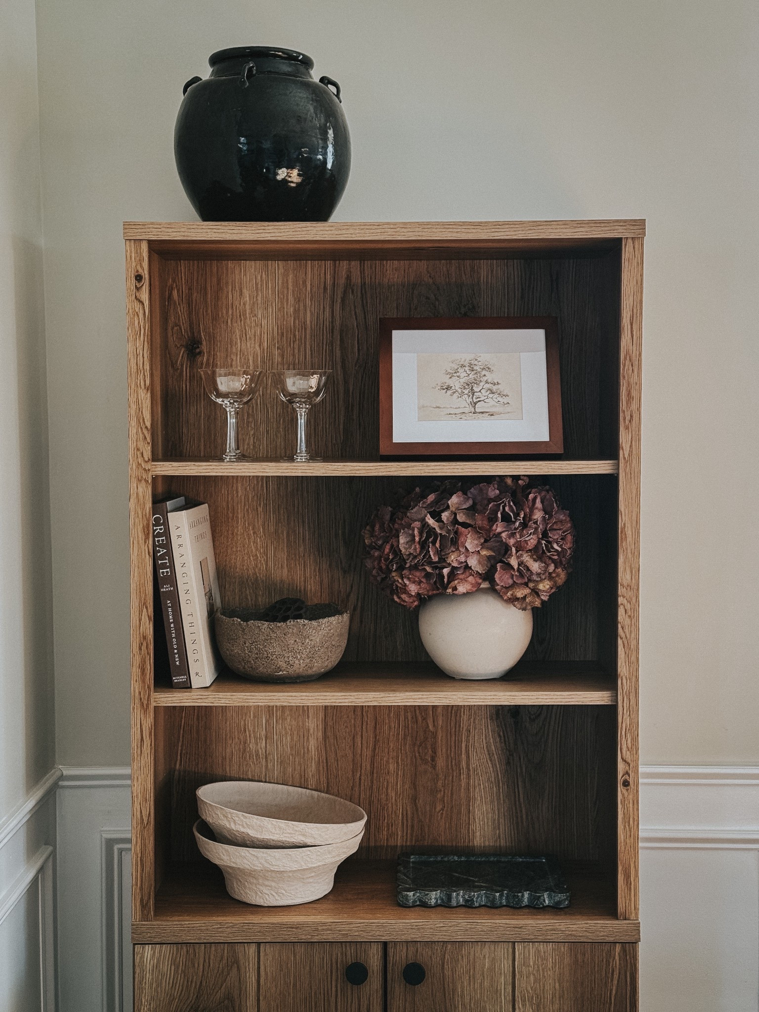 I mixed some of my old and “new” things here to create a simple, collected look. I love the neutral and moody tones of this. I kept this shelf styling simple, pretty, and functional. I linked some of the same products I used that are in stock and then linked similar options for those items that are vintage, old, or out of stock  

#LTKHome #LTKStyleTip