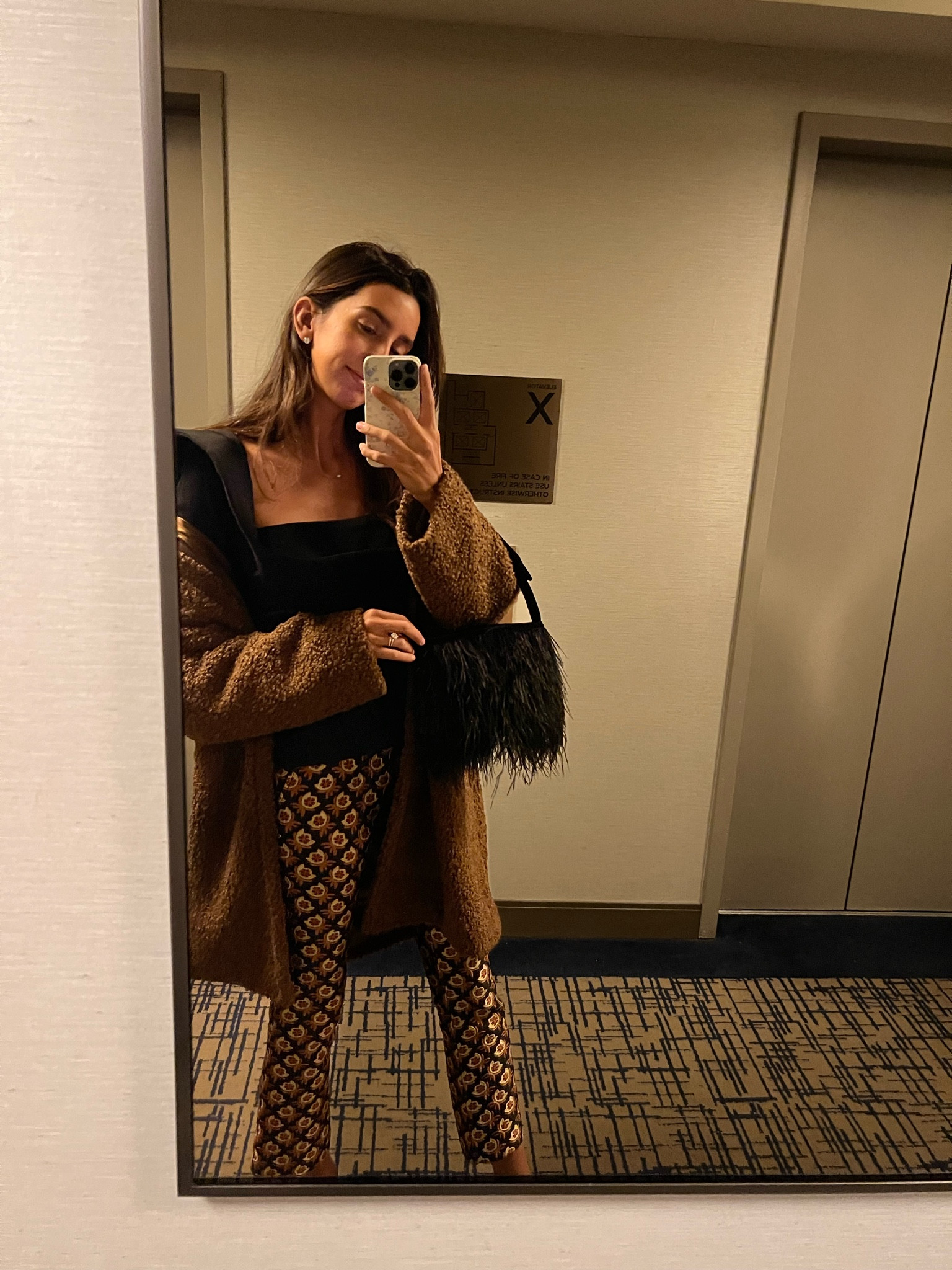 Holiday look with feathered bag

#LTKHoliday #LTKstyletip