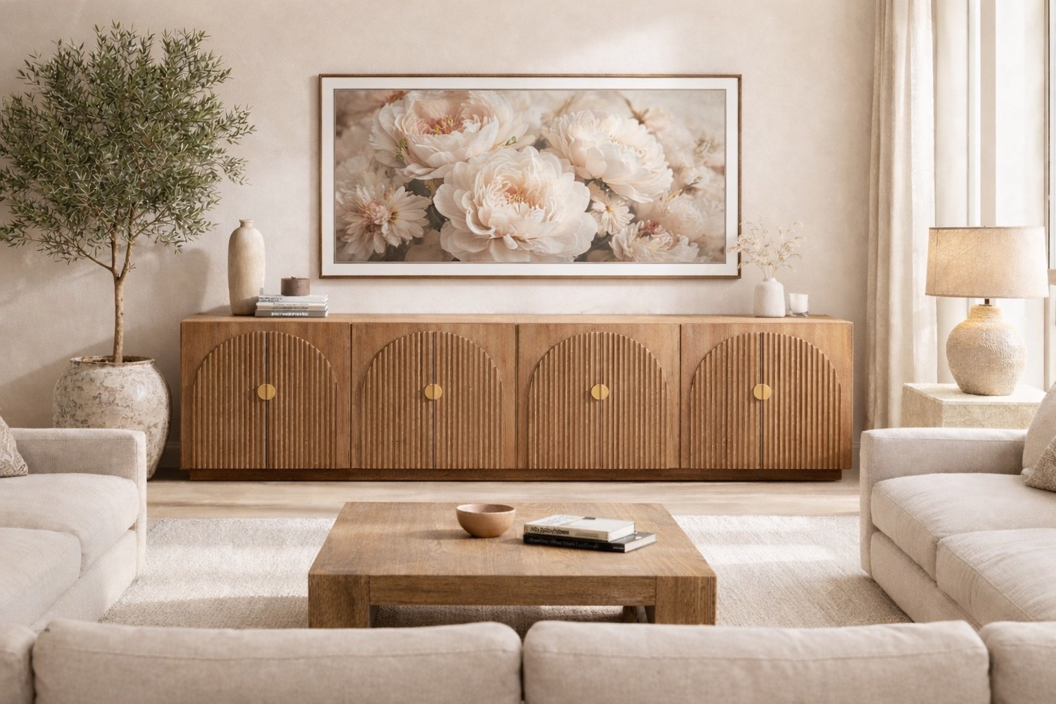 This sideboard is one of my favorite pieces in our home 🤤 
Warm wood, fluted detailing, and that sculptural arch design give it a true designer look without the designer price tag! 

I own this exact sideboard and I’m shocked it’s only $750 on Amazon right now. The scale is perfect, the quality is so high-end, soft close, and it instantly elevates any space. We styled it as a media console, but it would be stunning in a dining room, entry, or behind a sofa too😍

#amazonhome
#amazonfinds
#budgetfriendlyhome
#organicmodern
#warmcoastal
#neutralhome
#livingroomdecor

#LTKHome #LTKSaleAlert