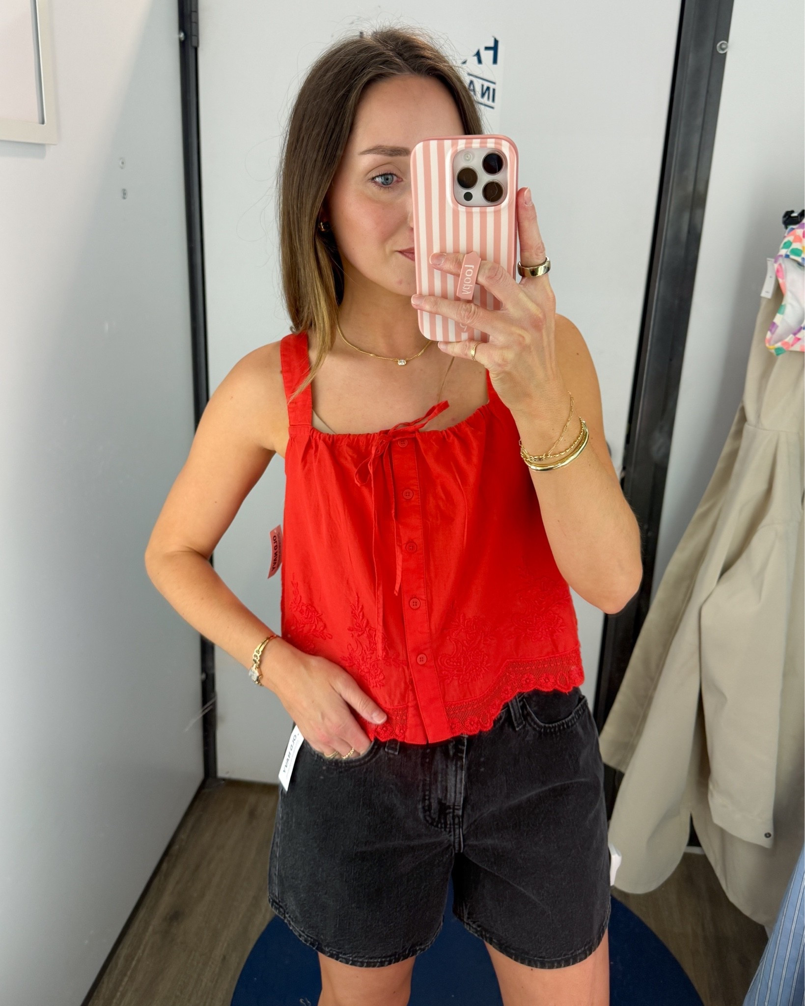 Both of these items are on sale today for under $20! I love this top and the drawstring makes the straps set wider or closer together depending on how tight you pull it. I’m wearing a small. Shorts are in a size 2. ￼￼