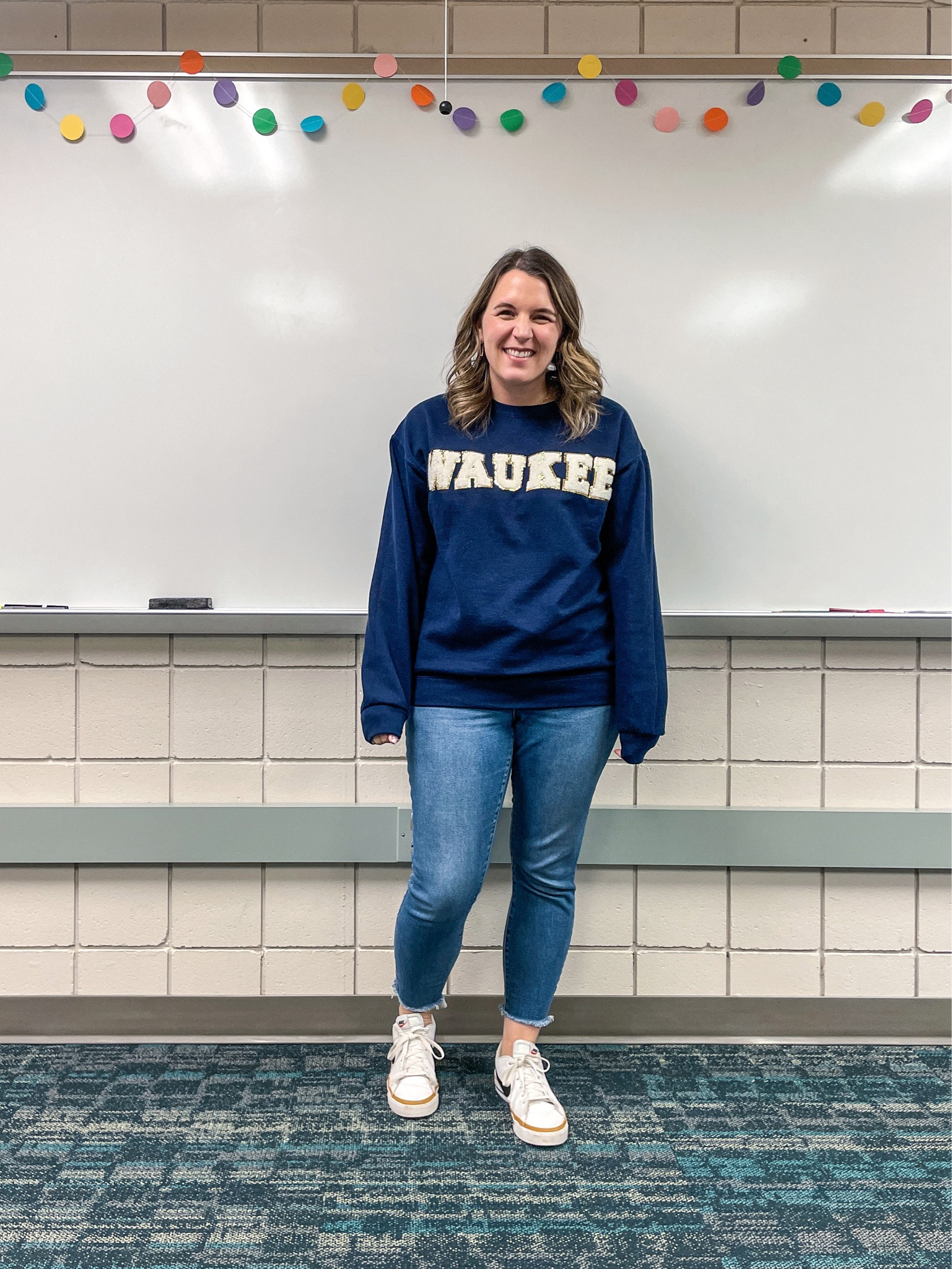 This sweatshirt always gets lots of compliments. It’s on Etsy & you can customize it to your team or school  

#LTKunder50 #LTKFind