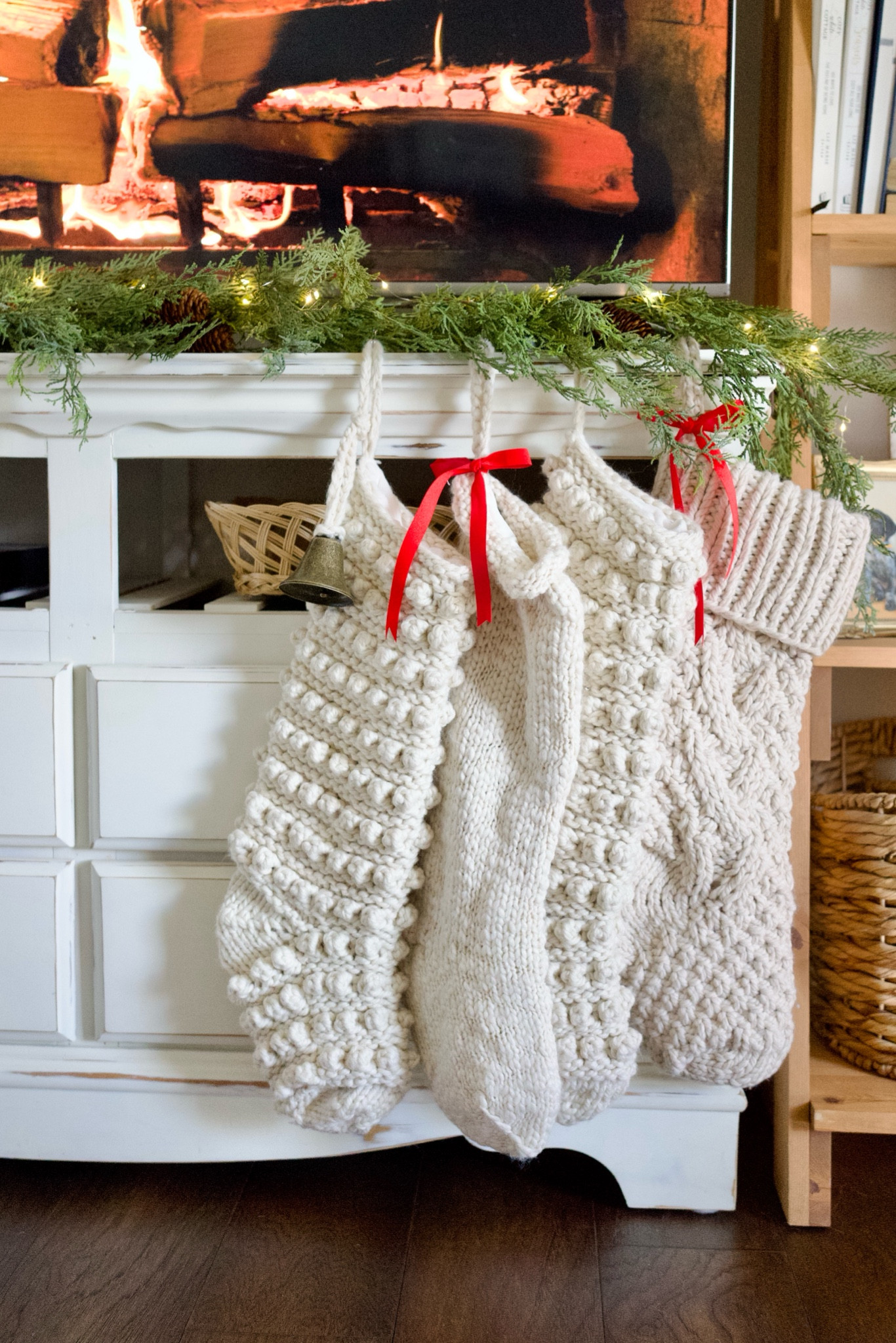 Cozy Christmas stockings hung with command hooks! Garland and Twinkle lights. Cozy Christmas. Christmas home. 

#LTKHome #LTKHoliday #LTKSeasonal