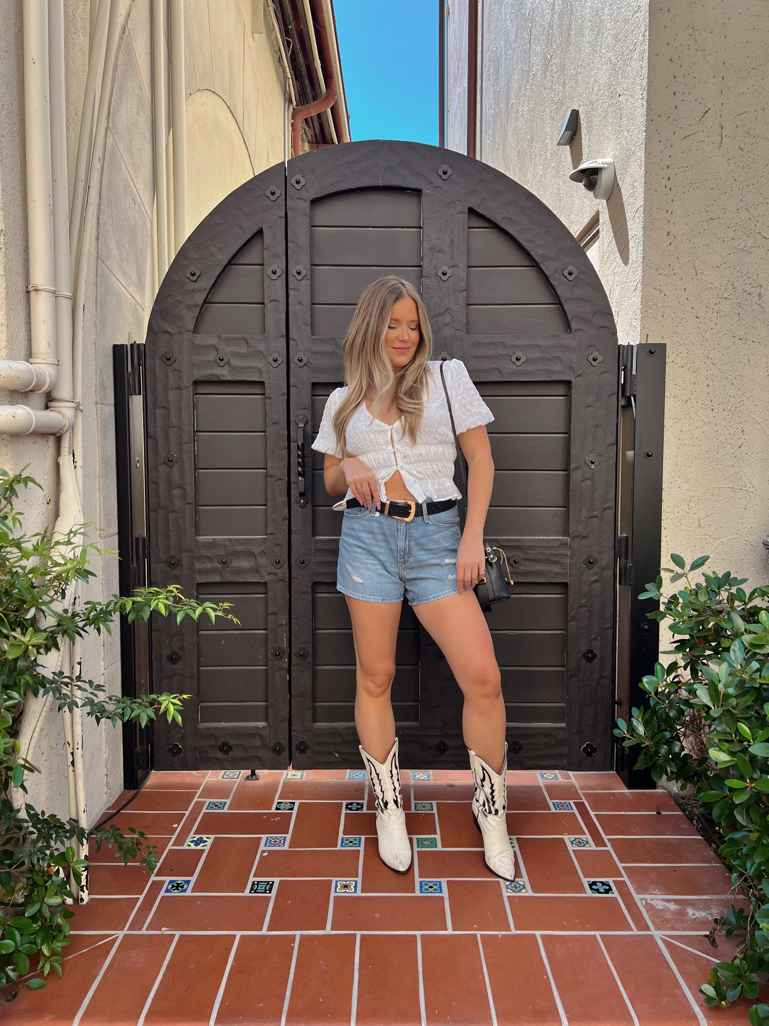 Lulus smocked top- size small / Levi’s shorts - size 27 / billini boots- TTS 

#LTKunder100 #LTKunder50 #LTKstyletip