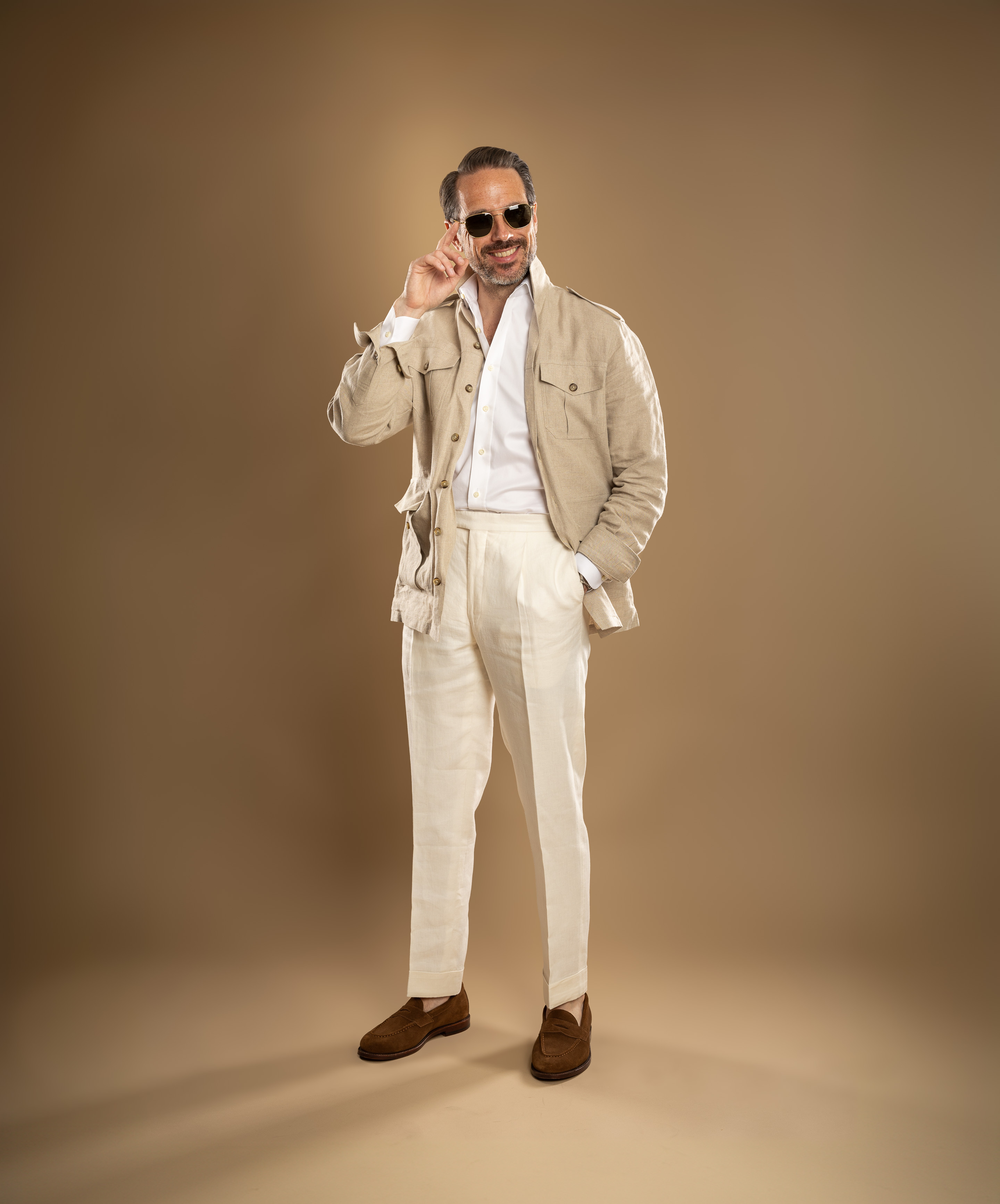 Safari jacket paired with a crisp white shirt for summer. #capsulewardrobe

#LTKStyleTip #LTKMens #LTKSeasonal