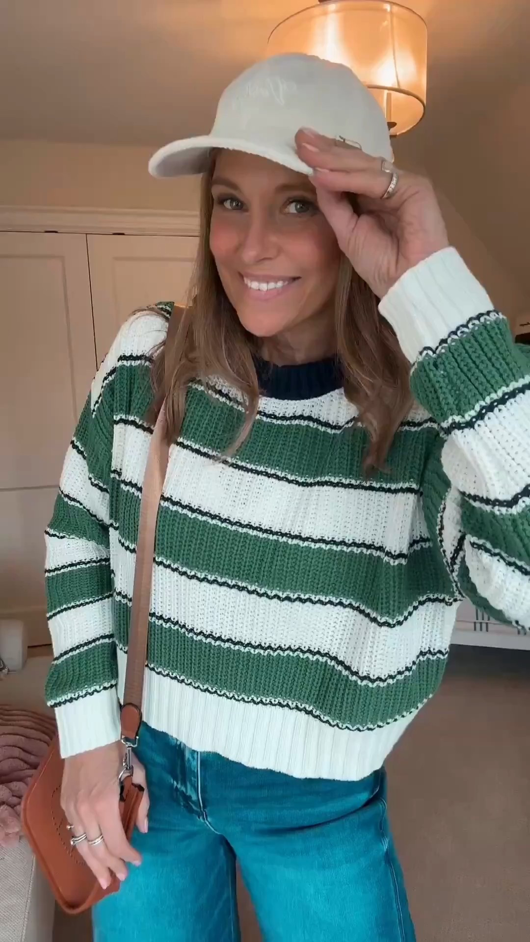 This green and navy sweater is such a fun find and makes the easiest everyday outfit. The color combo is so good, and it’s incredibly comfortable while still looking polished. For reference, I’m wearing a medium in the sweater and a size 30 in the jeans.

#LTKOver40 #LTKSeasonal #LTKMidsize