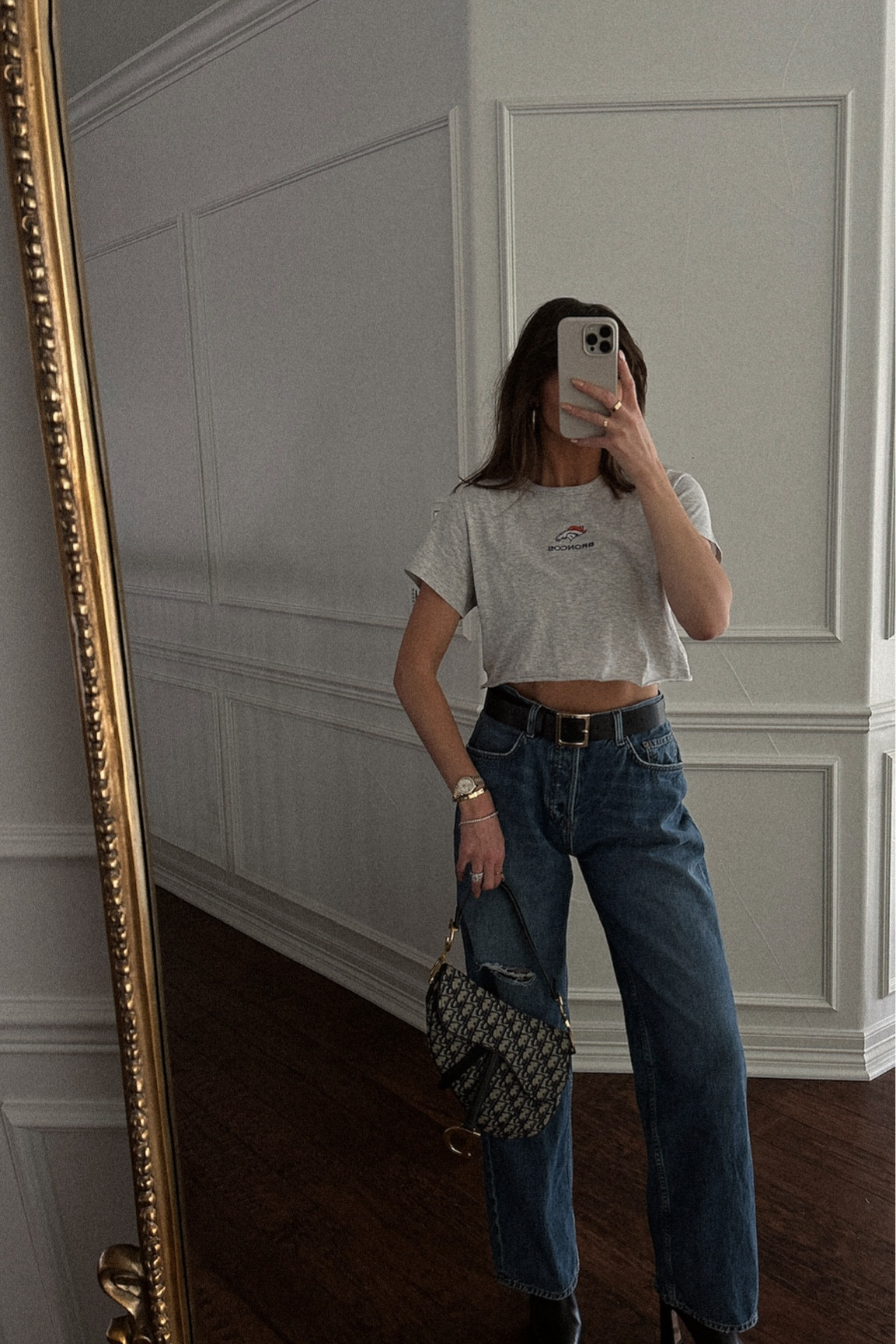my fav broncos abercrombie tee 🧡 princess Polly belt, grlfrnd jeans, Dior bag, revolve boots
