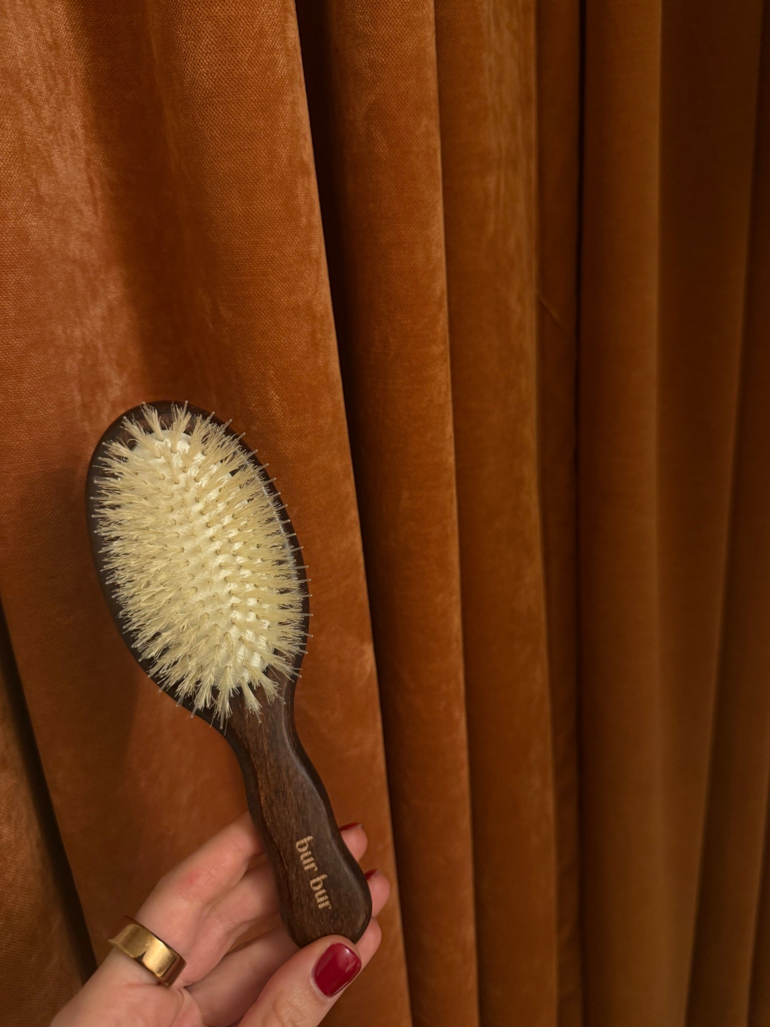 Boar bristle brush = necessity on my hair health journey!!!

Top Benefits of Using a Boar Bristle Brush:

1. Promotes Healthier Hair Growth
- Massages the scalp, boosting blood flow to hair follicles
- Encourages stronger, healthier hair from the root
- May help reduce hair loss and support new growth

2. Distributes Natural Oils
- Spreads sebum evenly from roots to tips
- Prevents greasy roots and dry, brittle ends
- Reduces the need for heavy conditioners or shine sprays

3. Adds Natural Shine
- Smooths the hair cuticle, reflecting more light
- Leaves hair looking glossy and vibrant—no chemicals needed

4. Reduces Frizz and Breakage
- Seals split ends and smooths flyaways
- Minimizes static electricity, especially in dry climates
- Makes hair more elastic and less prone to snapping

5. Gently Cleans the Hair and Scalp
- Removes dirt, dust, and product buildup like a magnet
- Helps keep the scalp balanced and less itchy

6. Improves Scalp Health
- Gentle bristle massage can exfoliate dead skin cells
- Supports a clean, healthy scalp—essential for hair growth

7. Enhances Styling
- Adds volume when brushing upside down
- Can help naturally straighten or smooth hair without heat

#LTKBeauty