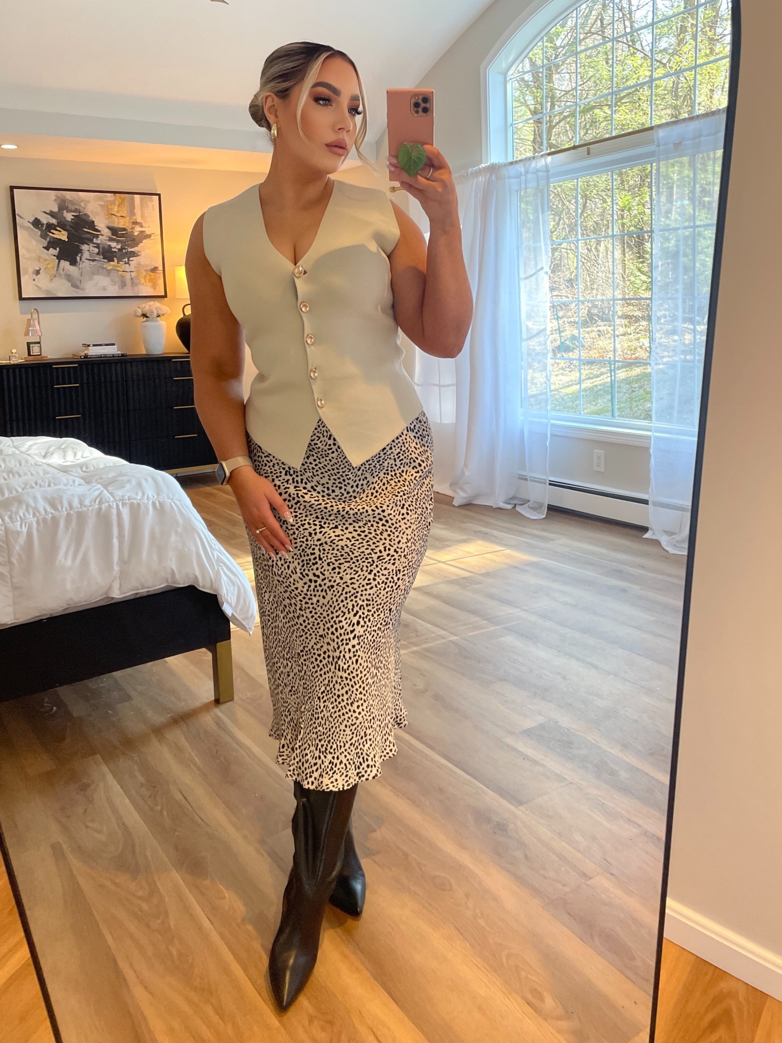 I’m loving this button down top paired with a leopard silk midi skirt and thigh high boots! The perfect office attire for March weather! 

#LTKFindsUnder50 #LTKWorkwear #LTKStyleTip