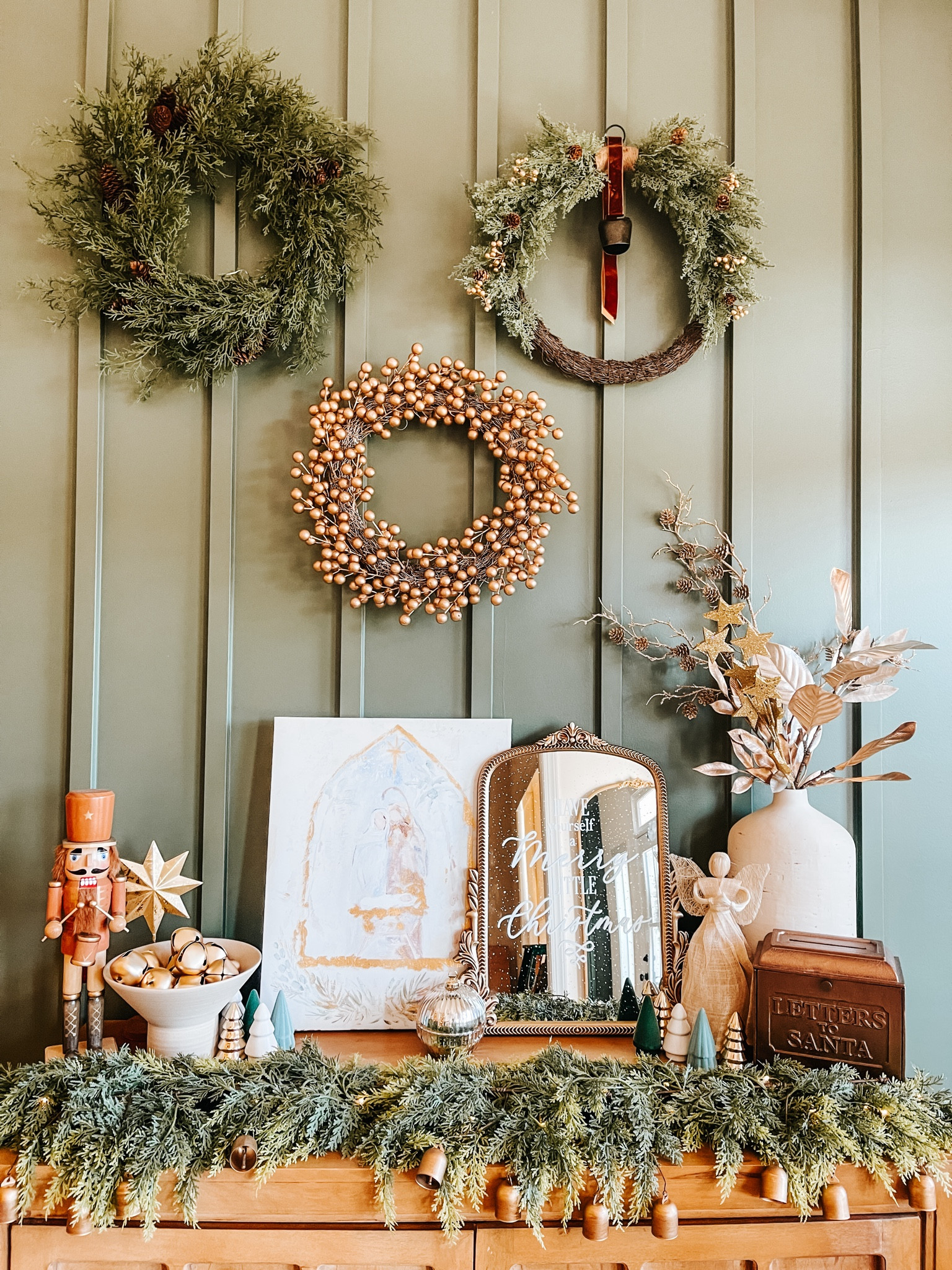 Christmas foyer: entryway table with mixes of browns & golds

#LTKhome #LTKSeasonal #LTKHoliday