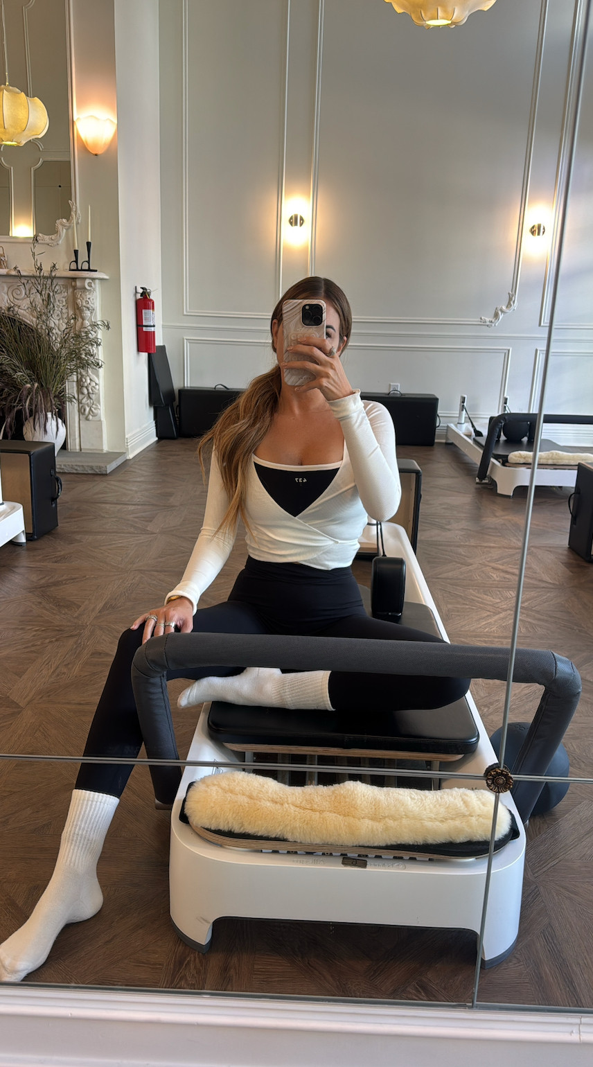 pilates ootd!  wearing a medium top and small in leggings and wrap 🖤

#LTKActive