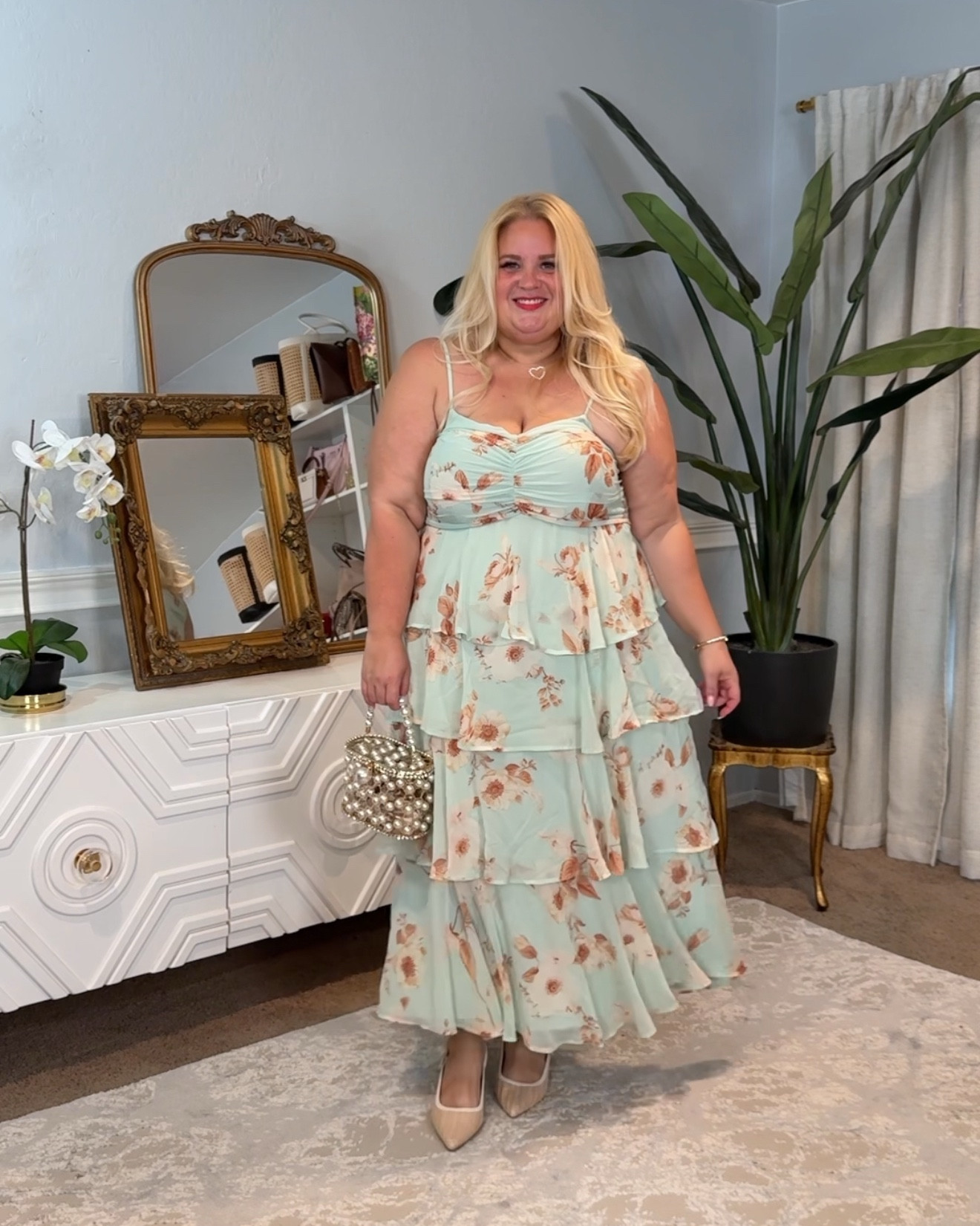 This wedding guest dress is so affordable but it looks expensive! Wearing 1x it is non stretch but there’s a stretch smocking in the back of the bust area

#LTKFindsUnder50 #LTKPlusSize #LTKWedding