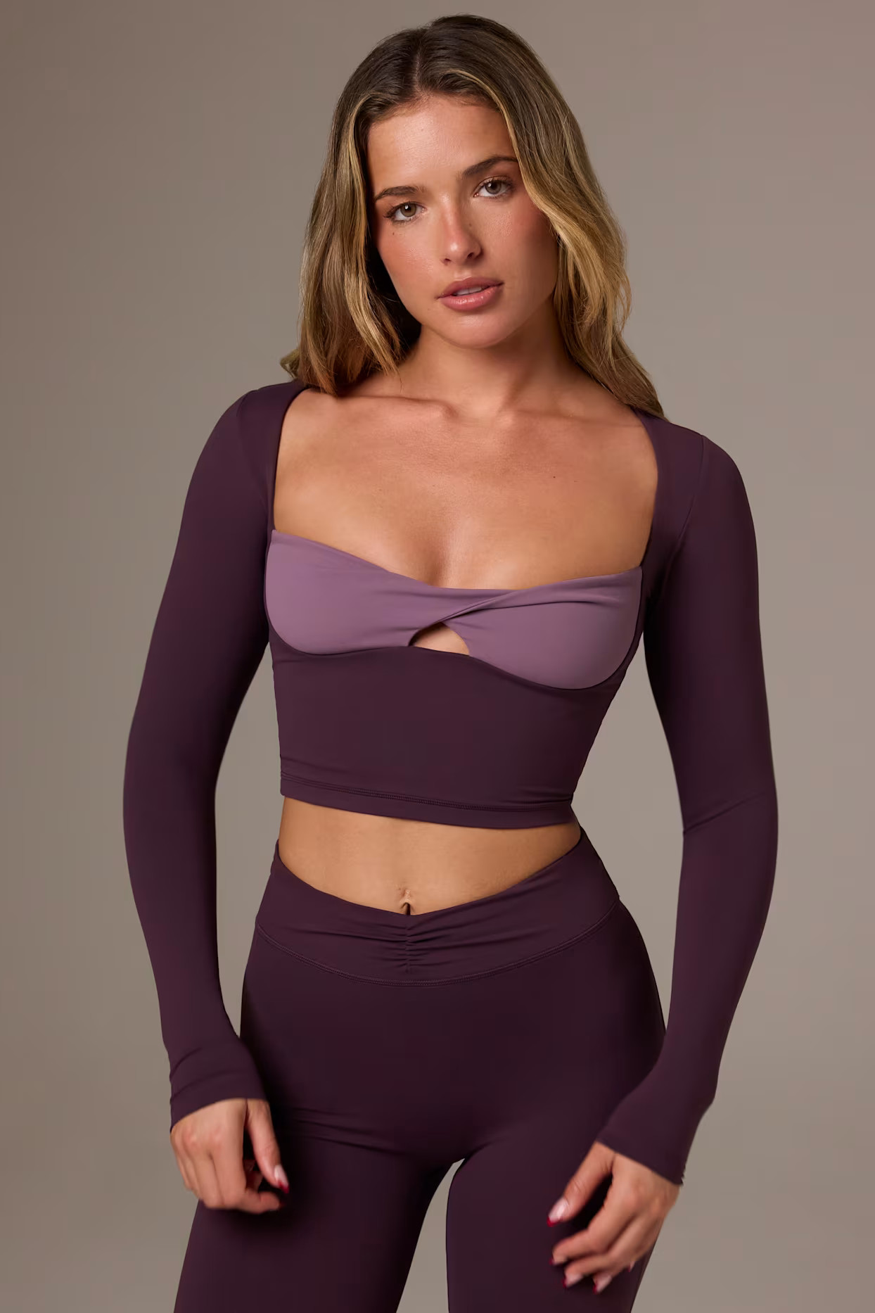 Soft Active Twist-Front Crop Top in Plum | Oh Polly