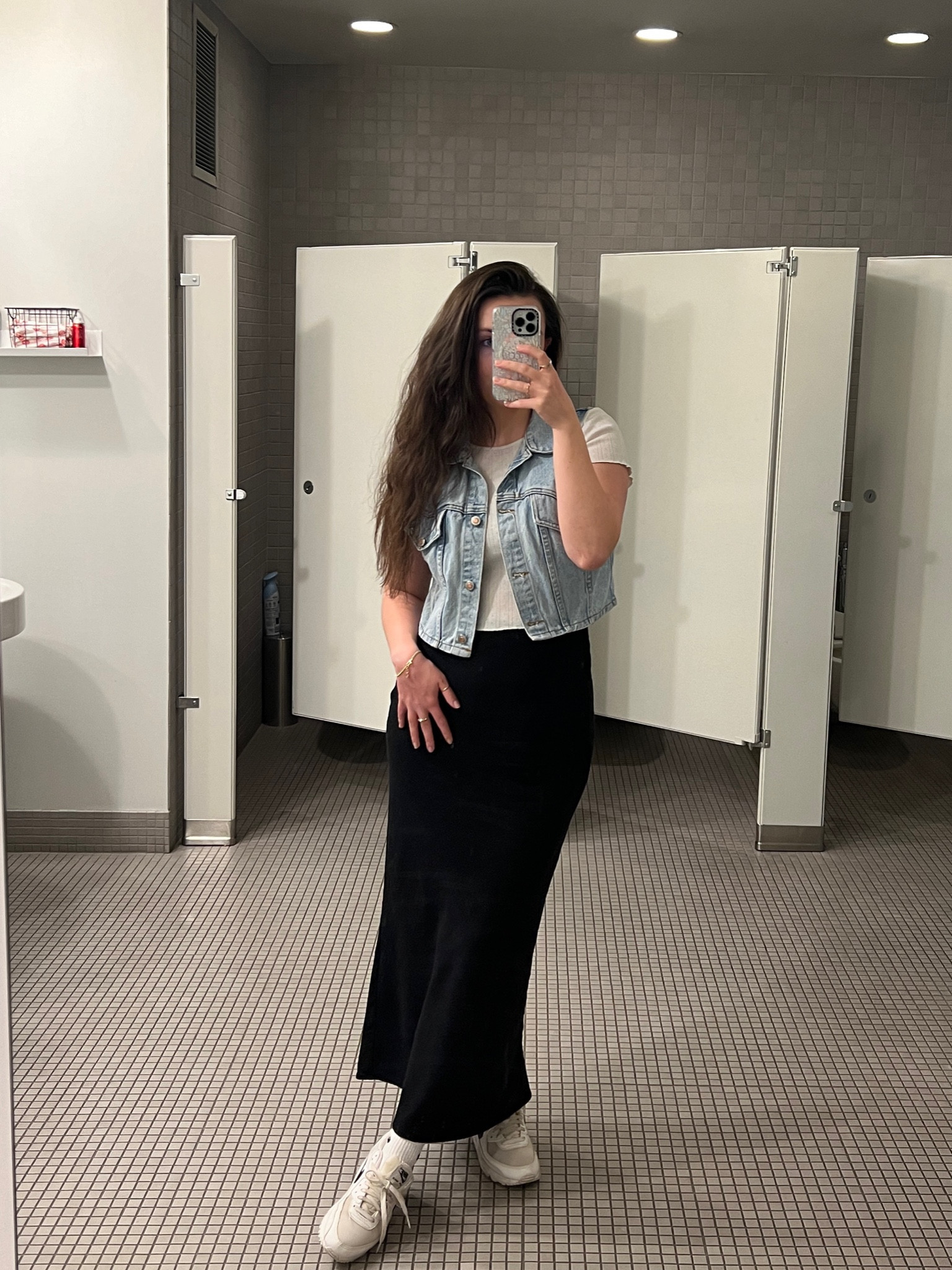 Denim jacket, jean vest, black maxi skirt, everyday tennis shoes, white crop top, casual street style

#LTKtravel #LTKSeasonal #LTKfindsunder50
