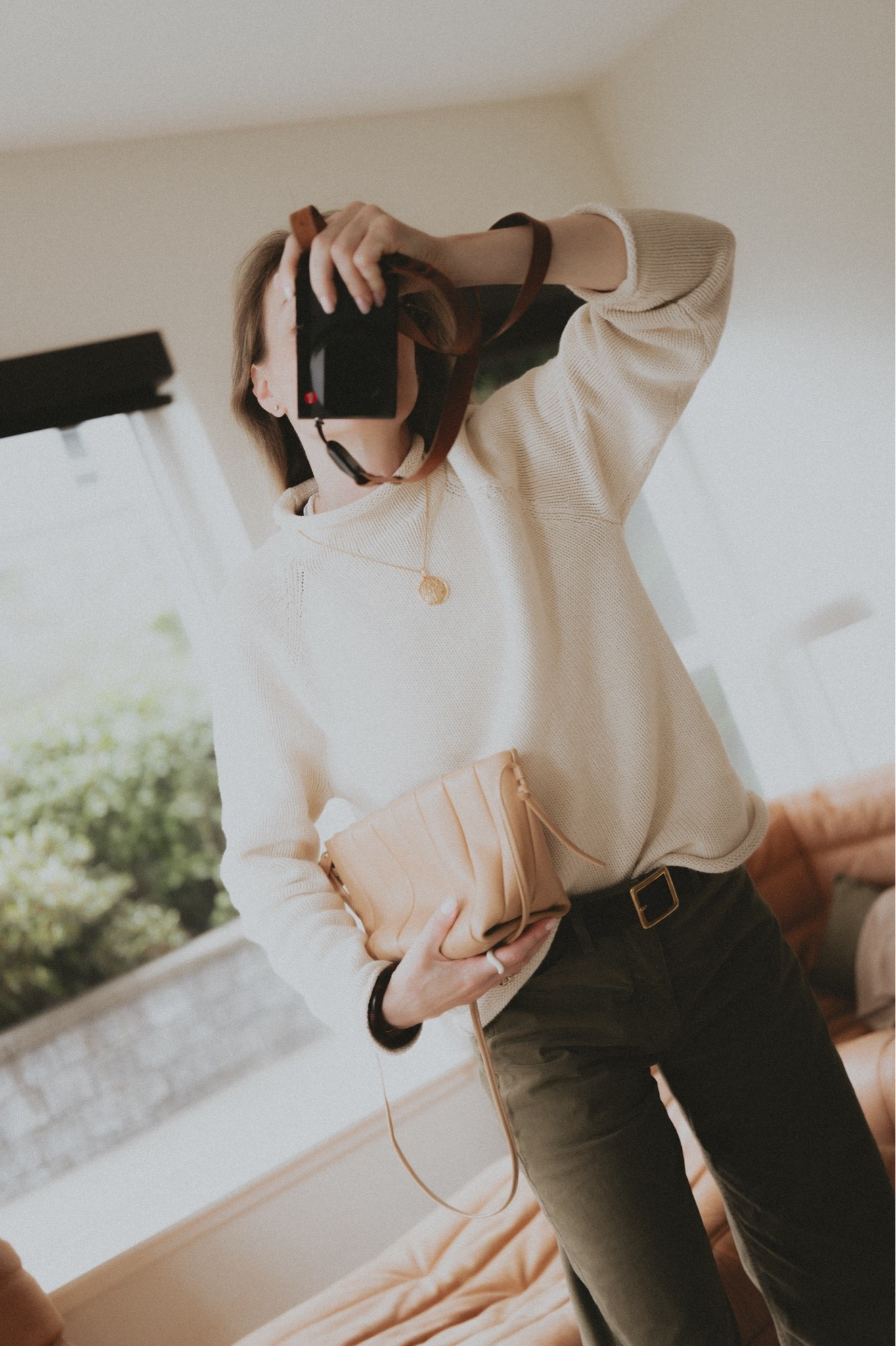 Rollneck sweater + coin necklace + cotton twill pants + mini bag. 
Cotton sweater @jcrew 1988 rollneck sweater 
Pants: Nili Lotan Tribeca 
Bag: Maeden Boulevard 
Jewelry: David Yurman

#LTKootd #LTKSeasonal #LTKWorkwear