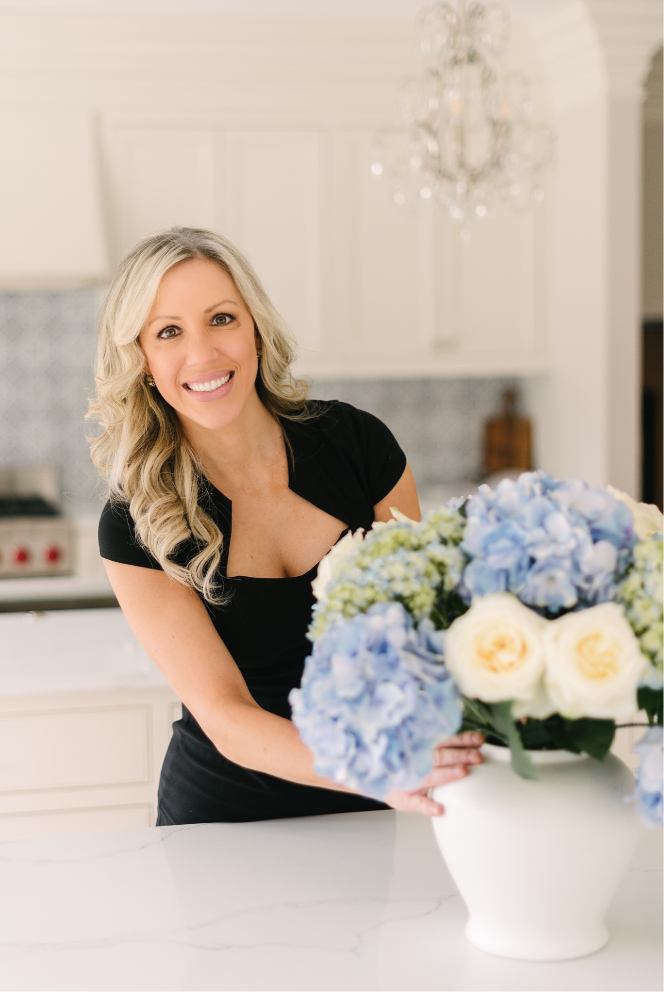 Little black dress 
Hydrangeas white vase 
Mini crystal chandelier Photoshoot outfit work outfit 

#LTKhome #LTKunder50 #LTKworkwear