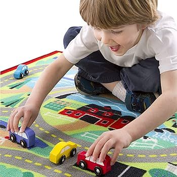 Melissa & Doug Round the Town Road Rug and Car Activity Play Set With 4 Wooden Cars (39 x 36 inch... | Amazon (US)
