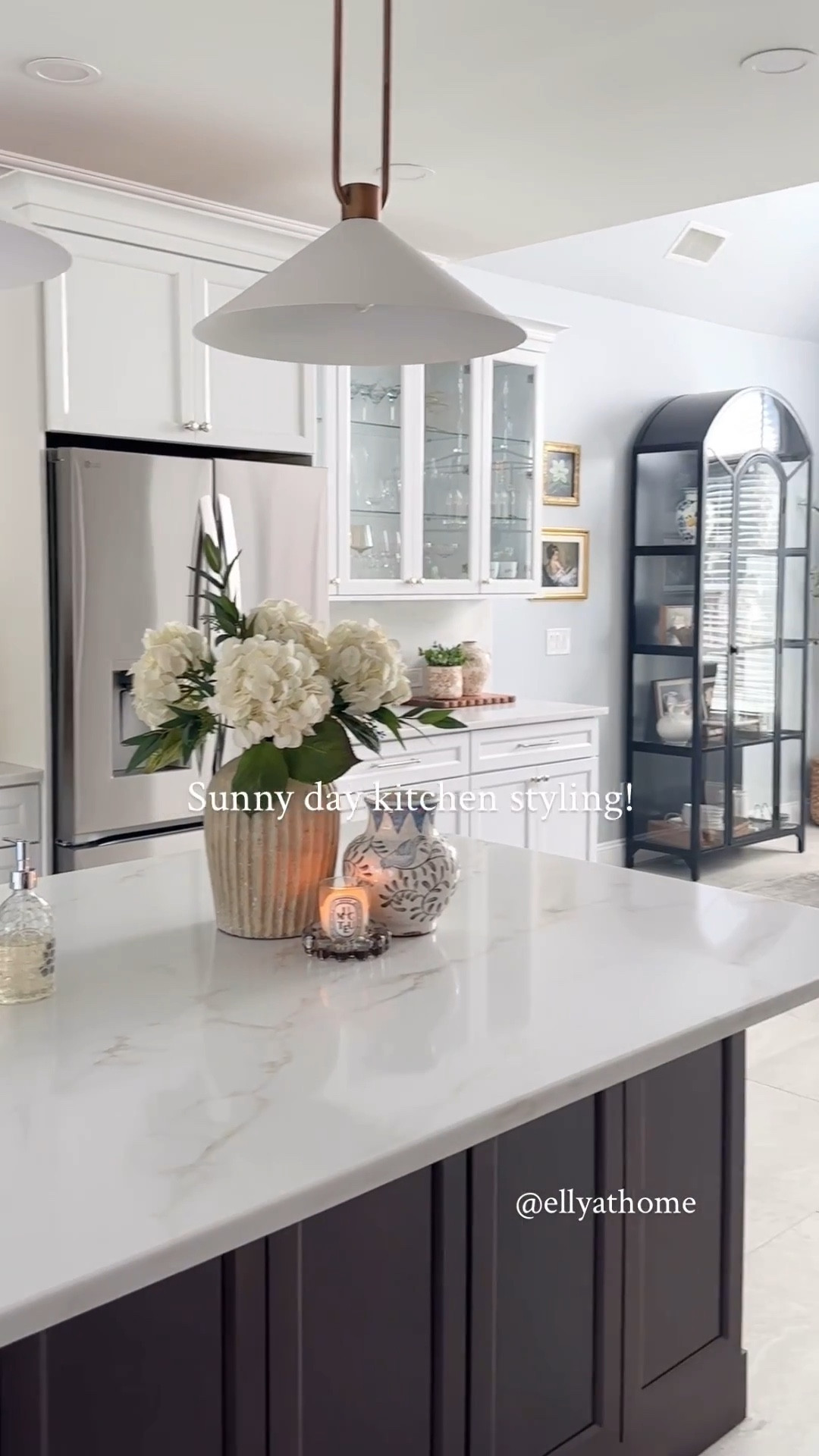 Spring kitchen styling. Pendant light, vase on sale, florals, candles, kitchen decor, cabinet, chandelier, sconces and more home decor and kitchen links  