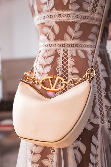 I am in love with this beautiful Valentino crossbody. The gold chain detail adds a really chic and luxurious element to every outfit. I carried this handbag all through Italy and I’ll definitely be wearing it all summer long! 

~Erin xo 

#LTKItBag #LTKTravel