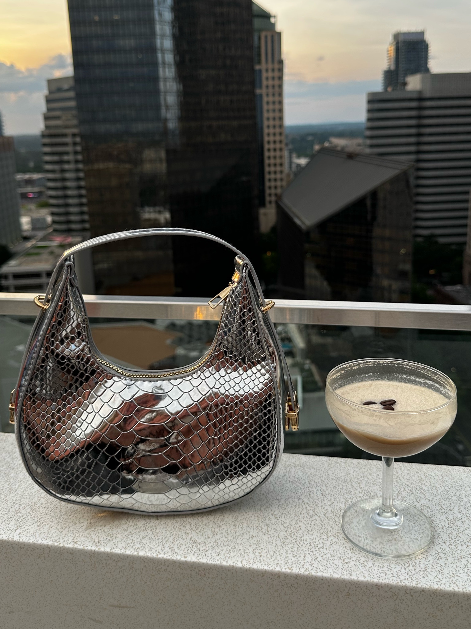 this metallic silver bag is so cute and trendy! plus for the gold jewelry girlies out there, it won’t clash because it has gold hardware 🪩✨

#LTKsalealert #LTKitbag #LTKFind