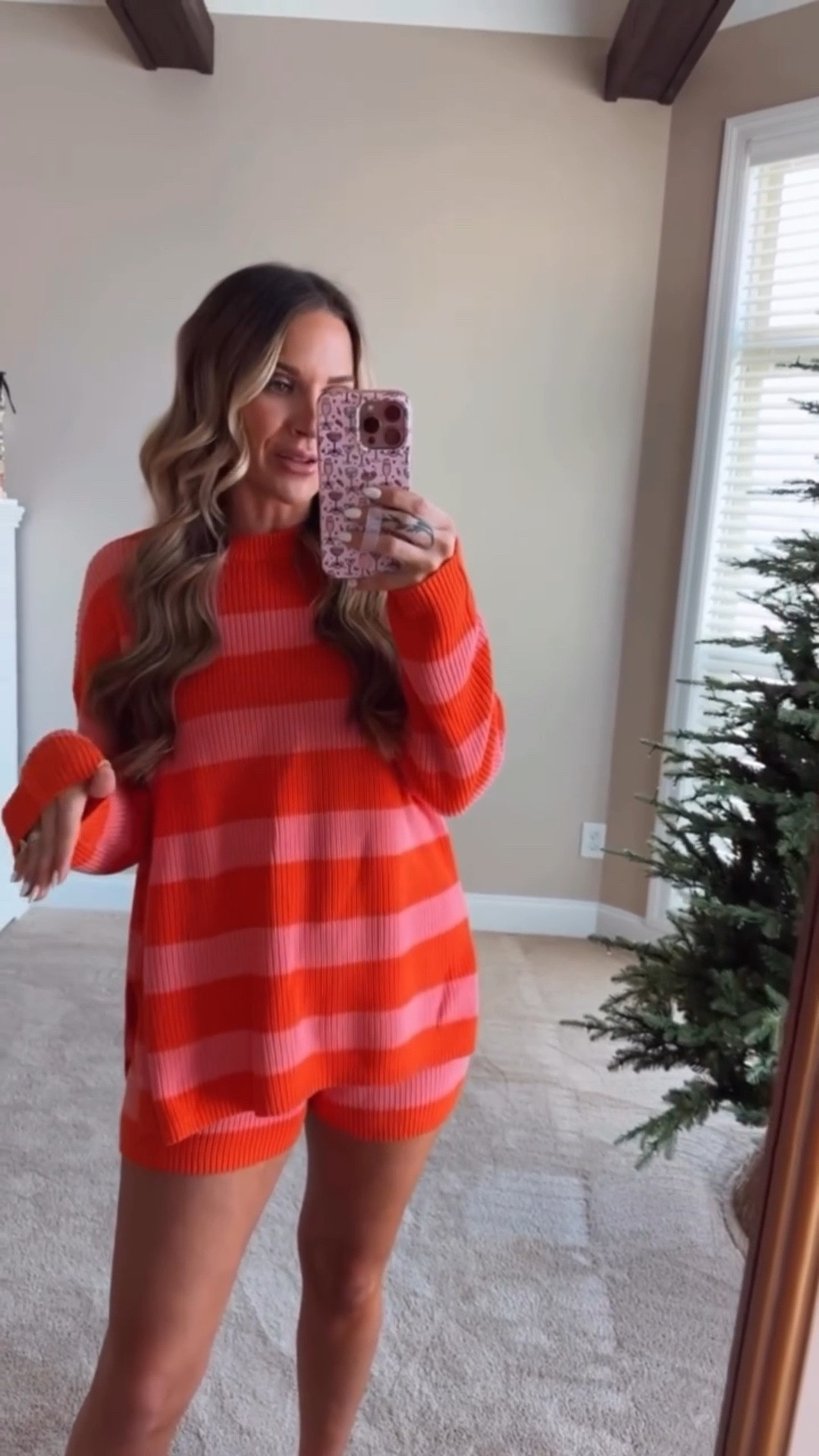 This striped 2 piece sweater and shorts set is my absolute favorite. It's another look for less with a pop of orange and pink that's perfect for spring. I'll mix and match these pieces for different looks, or wear them together for a put together errands outfit, travel outfit, or a lounge around the house day. 
I'm 5'6 140lbs wearing size small in this pink and orange striped 2pc set  

 #LTKgrwm #LTKSeasonal #LTKTravel