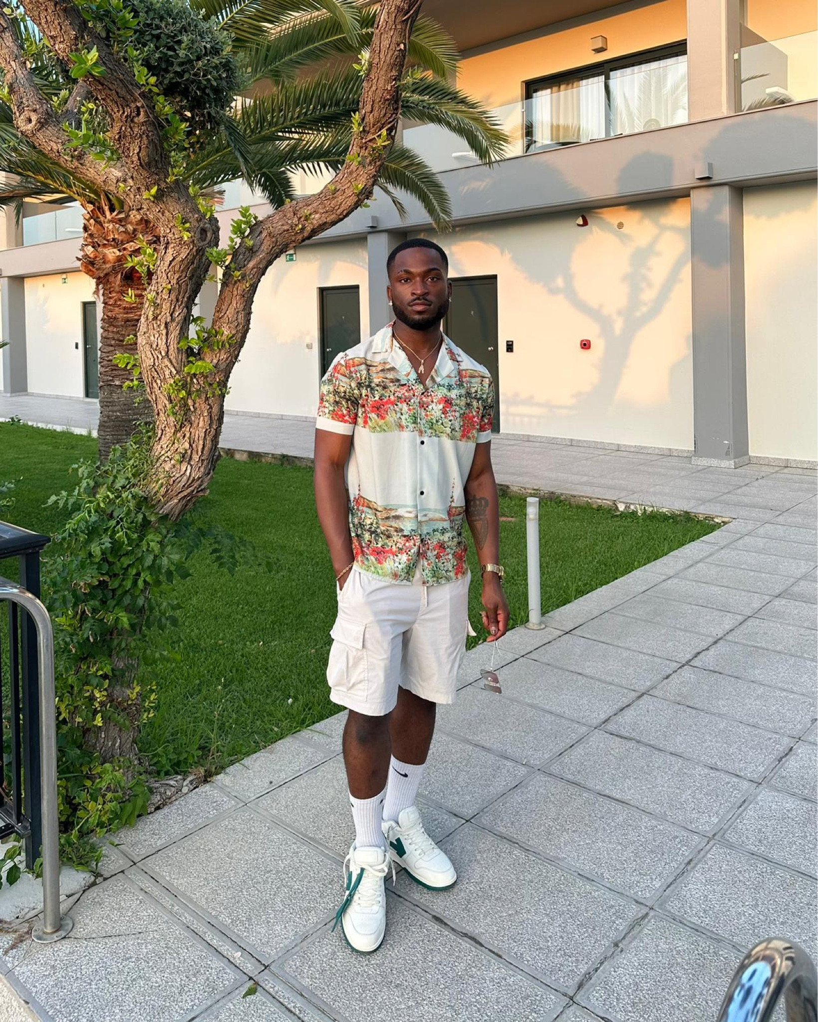 Men fashion, holiday outfits, off white out of office trainers, Bape star trainer, green and white, Nike socks, cream cargo shorts, men floral shirt

#LTKstyletip #LTKSeasonal #LTKeurope