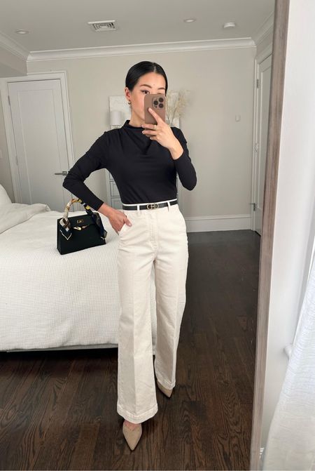 black mock neck top + cream trousers // how to style trouser jeans 

•Ann Taylor trouser jeans 00 petite
•AT mockneck top - sold out, similar options linked
•H&M slingbacks sz 5 - my exact pair are from a prior year, I’ve linked their current styles 
•Edited Pieces mini belt (coming soon!)

#petite 

#LTKworkwear #LTKstyletip #LTKSeasonal