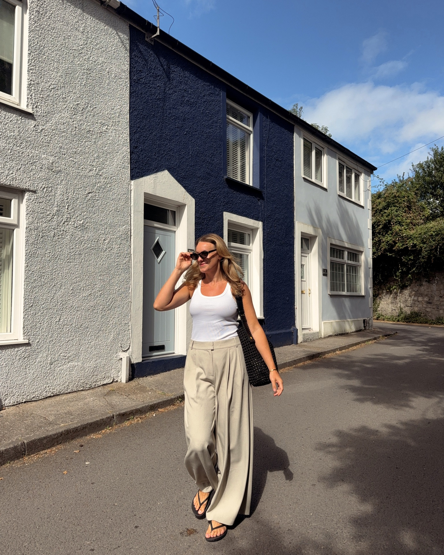 White tank top, stone oversize trousers (wearing size 14) black woven shoulder bag, black fitflops - Sunday outfit of the day

#LTKmidsize #LTKsummer #LTKuk