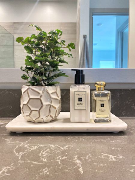 Bathroom counter styling. I love a simple tray with just a few things on it! #jomalone #bathroom 

#LTKunder100 #LTKhome #LTKunder50