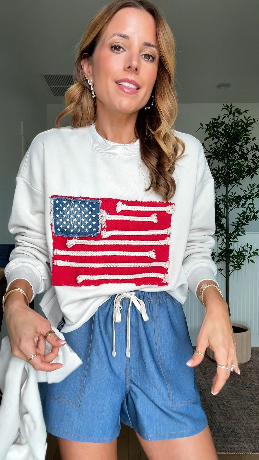 I found the viral American flag sweatshirt. Wearing XXS. I snipped the bottom to turn it into a crop style. It is so soft!! Size XS in shorts. 4th of 4th of July outfit. Summer outfit. Casual outfit. Lake outfit. Boating outfit.

#LTKootd #LTKTravel #LTKSwim
