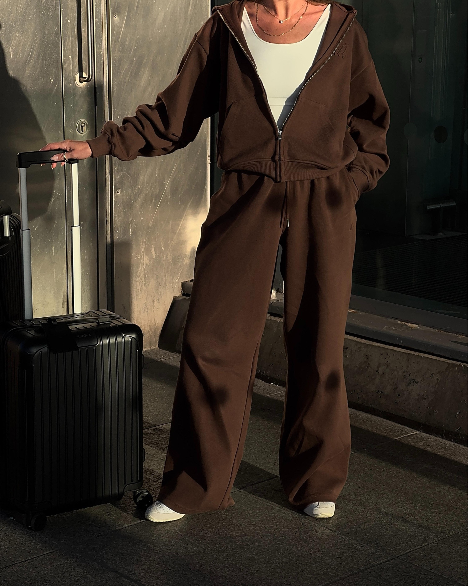 Maebe tracksuit | Rimowa suitcase | BOA vest | ByRedo perfume | Summer Fridays lip balm 

Airport outfit, travelling outfit, comfy outfit, joggers, hoodie, airplane outfit, casual outfit, brown tracksuit, athleisure

#LTKbeauty #LTKtravel #LTKuk