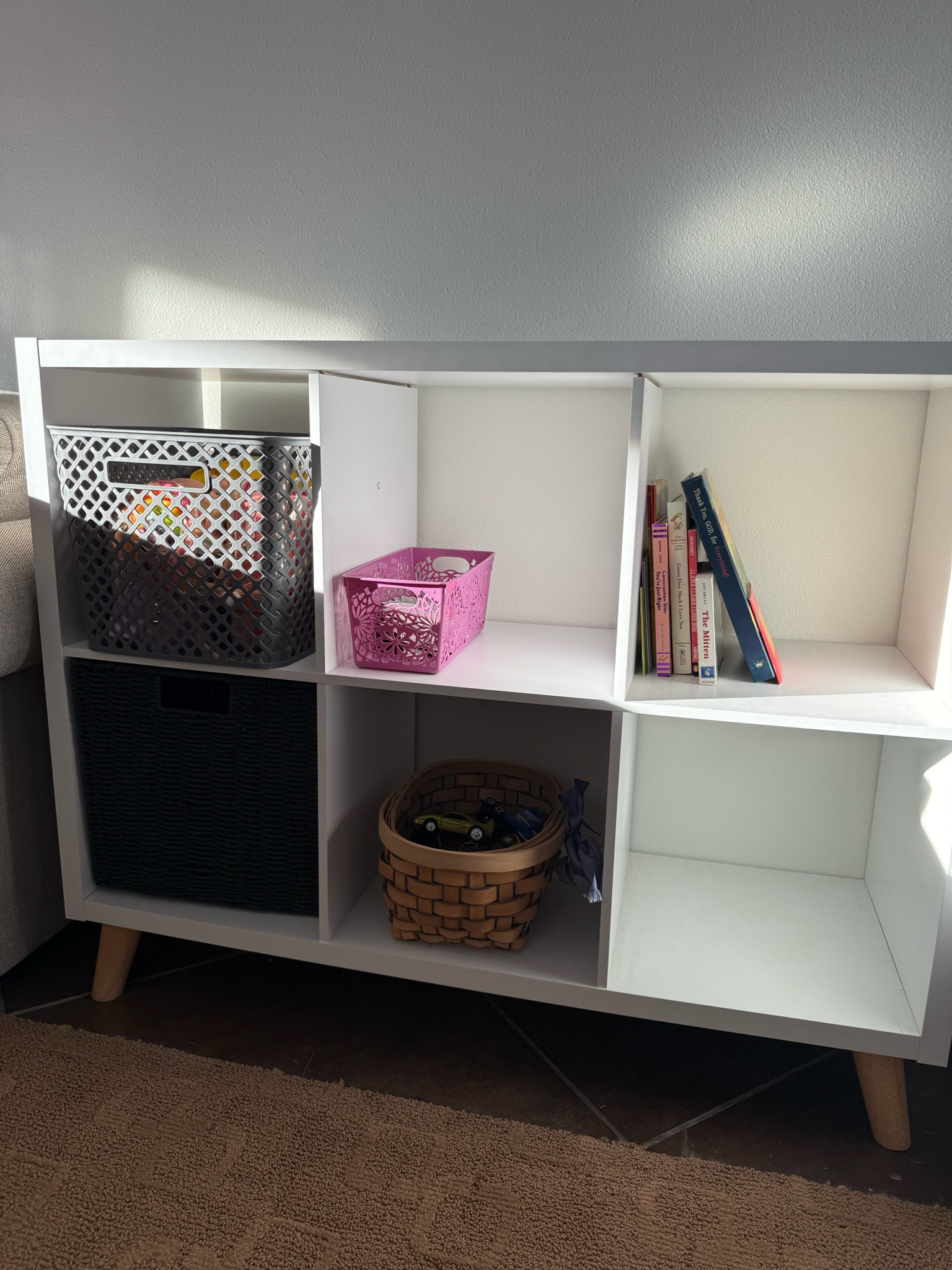 Toy storage 
6 cube organizer (on sale @ target) with wooden legs from Amazon! 
Linking the toy organization too  

#LTKFamily #LTKKids #LTKHome