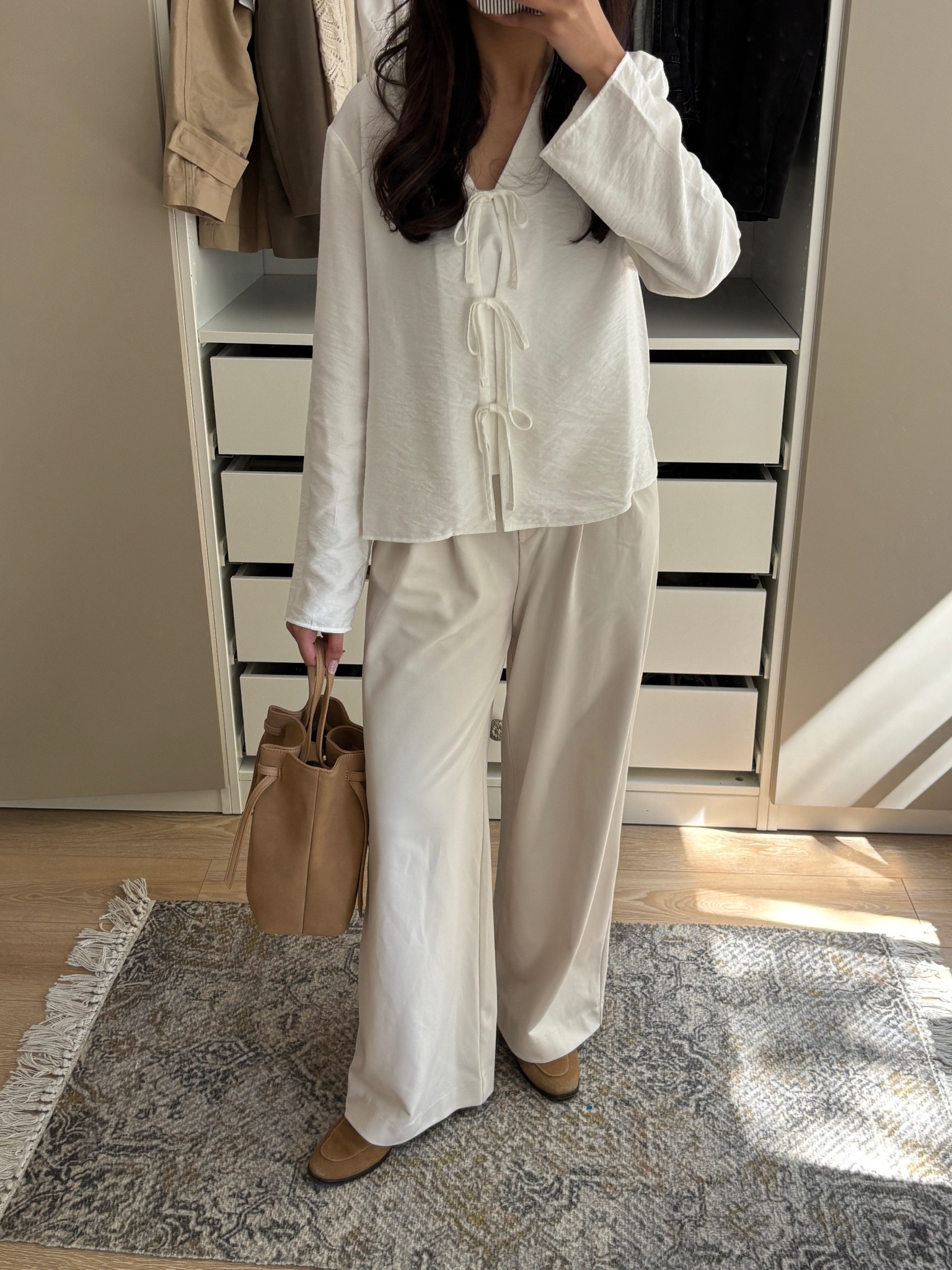 sainsburys, h&m, mango, katie loxton, bow tie front top, bow tie blouse, summer blouse, white blouse, flowy summer blouse, full sleeve blouse, white trousers, monochrome outfit, tan suede loafers, summer loafers, suede bag, suede bucket bag 

#LTKfindsunder50 #LTKSeasonal #LTKeurope