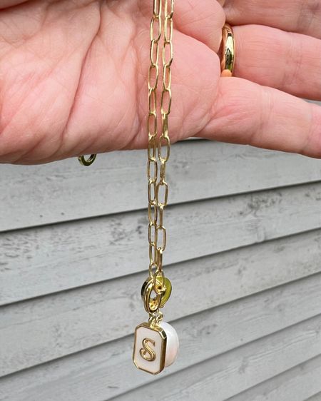 I love giving and receiving personalized jewelry. This is a pretty gold paperclip style chain with 2 charms. I chose the mother of pearl and gold initial pendant. They have so many to choose from. #giftidea #goldaccessories #midlifefashion #trendystyle 

#LTKStyleTip #LTKFindsUnder100 

#LTKGiftGuide