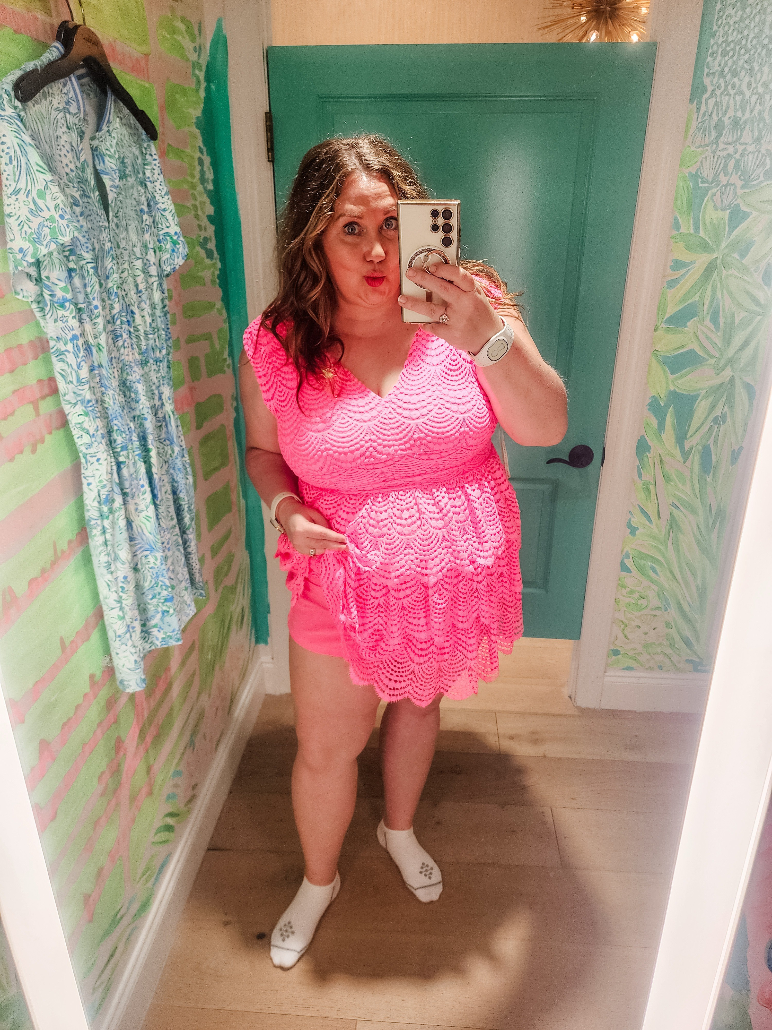 I'm glad I decided to wait and try this one on before buying it. First let me say that this fabric type is one of my favorites that lilly uses. I have multiple dresses in this fabric. However this dress is SO short. I put it on and thought maybe a layer was rolled or stuck under somewhere and my 7 yr old was giggling and said " Moooommm, that's too short it shows your booty!" I have a Faye dress at home in an XL that I wore to the Barbie movie and it is no where near this short. The color - fabulous. Roxie Pink Scalloped Shell LaceI am 5'7. 

#LTKmidsize #LTKplussize